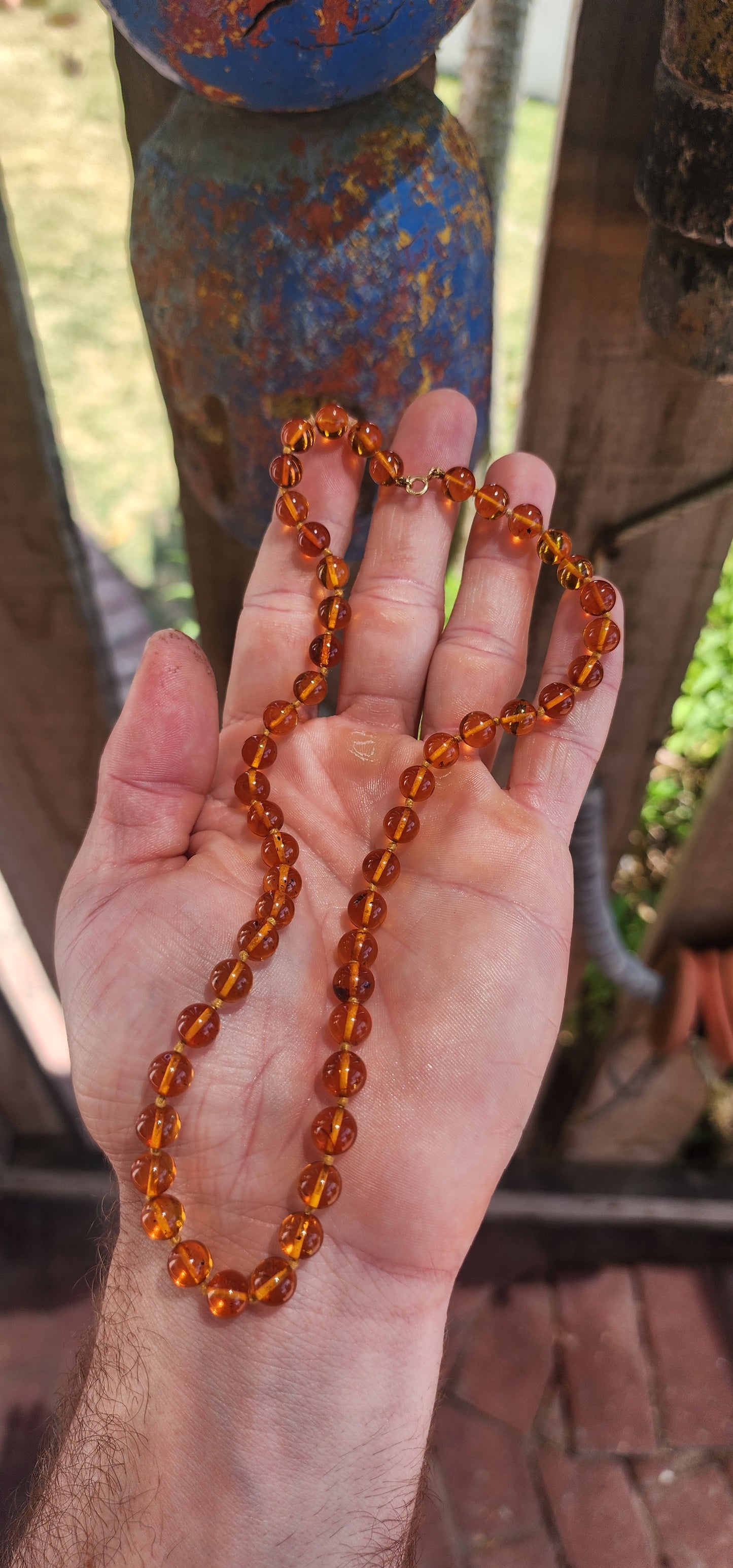 A warm sun-kissed treasure, this beautiful vintage cognac Baltic amber necklace radiates honey-rich glow and natural charm.
