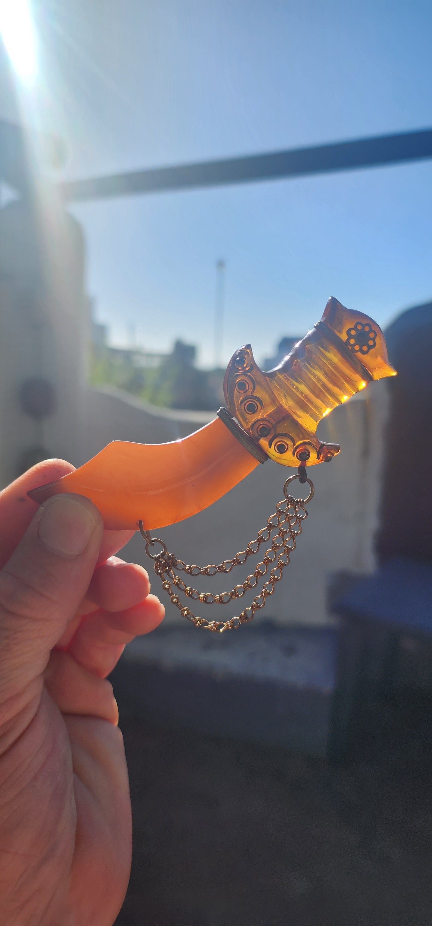 Marvelous and oversized Art Deco–era bakelite novelty brooch, exquisitely carved in the exotic form of a Persian dagger (khanjar)