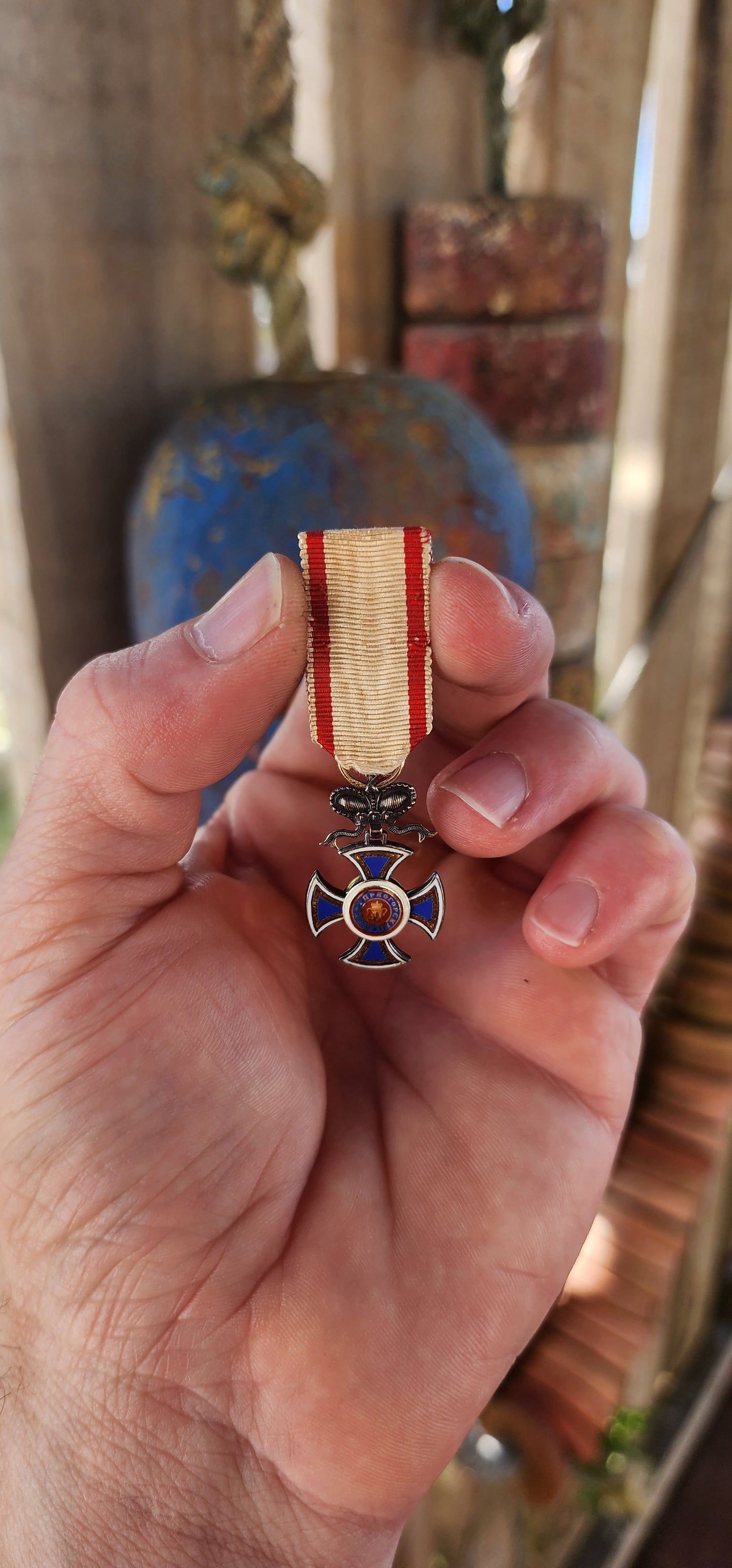 A scarce and beautiful miniature example of the Order of Danilo I (Danilov Orden) from the Kingdom of Montenegro, crafted circa 1900 in sterling silver with exquisite hand-applied enamel.