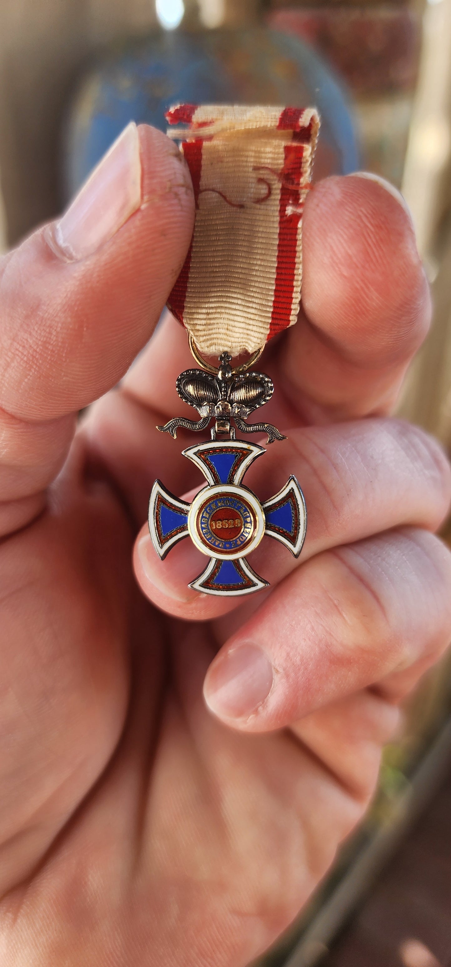 A scarce and beautiful miniature example of the Order of Danilo I (Danilov Orden) from the Kingdom of Montenegro, crafted circa 1900 in sterling silver with exquisite hand-applied enamel.