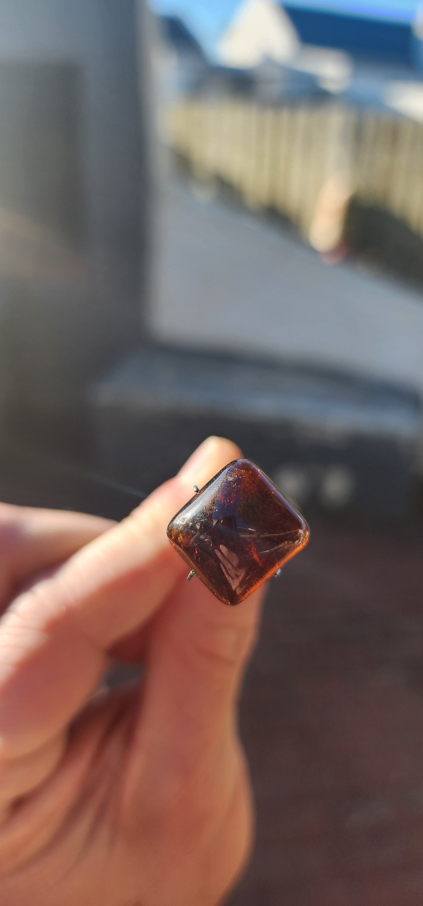 Behold this generous, dark burnt-orange tourmaline cabochon, masterfully shaped in the coveted sugar-loaf cut—a style treasured since ancient times for its softly domed peak and rounded geometric form.