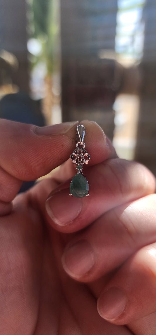 The Emerald Pendant – A Petite Heirloom of Sterling Silver.