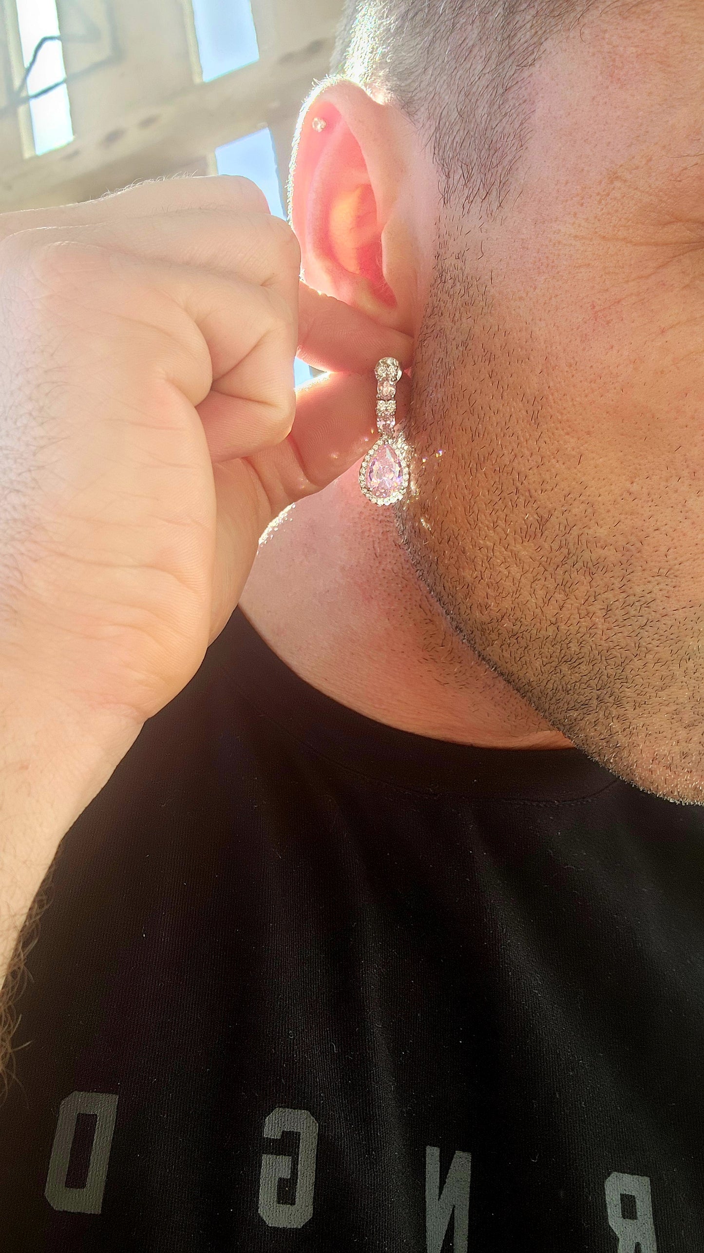 Crafted in solid sterling silver, these drop earrings are a dazzling celebration of all things feminine, flirty, and fabulously glamorous.