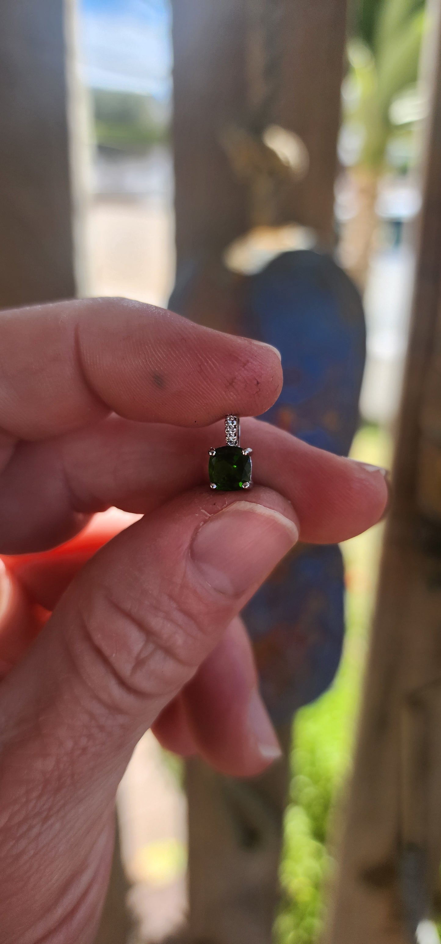 Small in size, MASSIVE in impact!
This elegant sterling silver Tsavorite pendant.