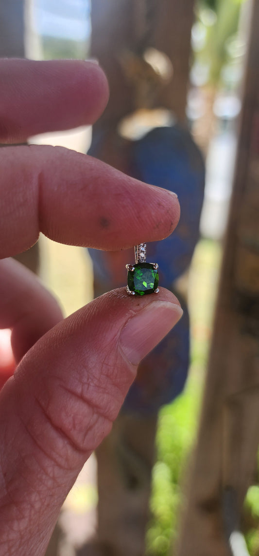 Small in size, MASSIVE in impact!
This elegant sterling silver Tsavorite pendant.