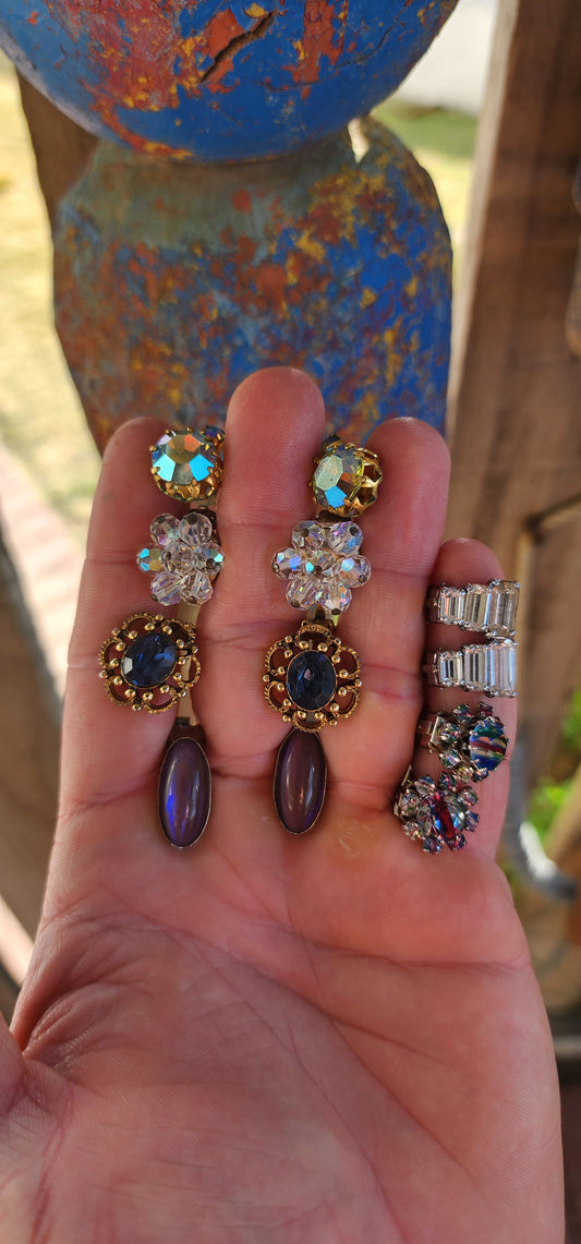 A dazzling lot of six marvelous vintage costume clip-on earring pairs — each one with its own personality, era, and mood. Small in size but BIG on charm, sass, colour and sparkle!