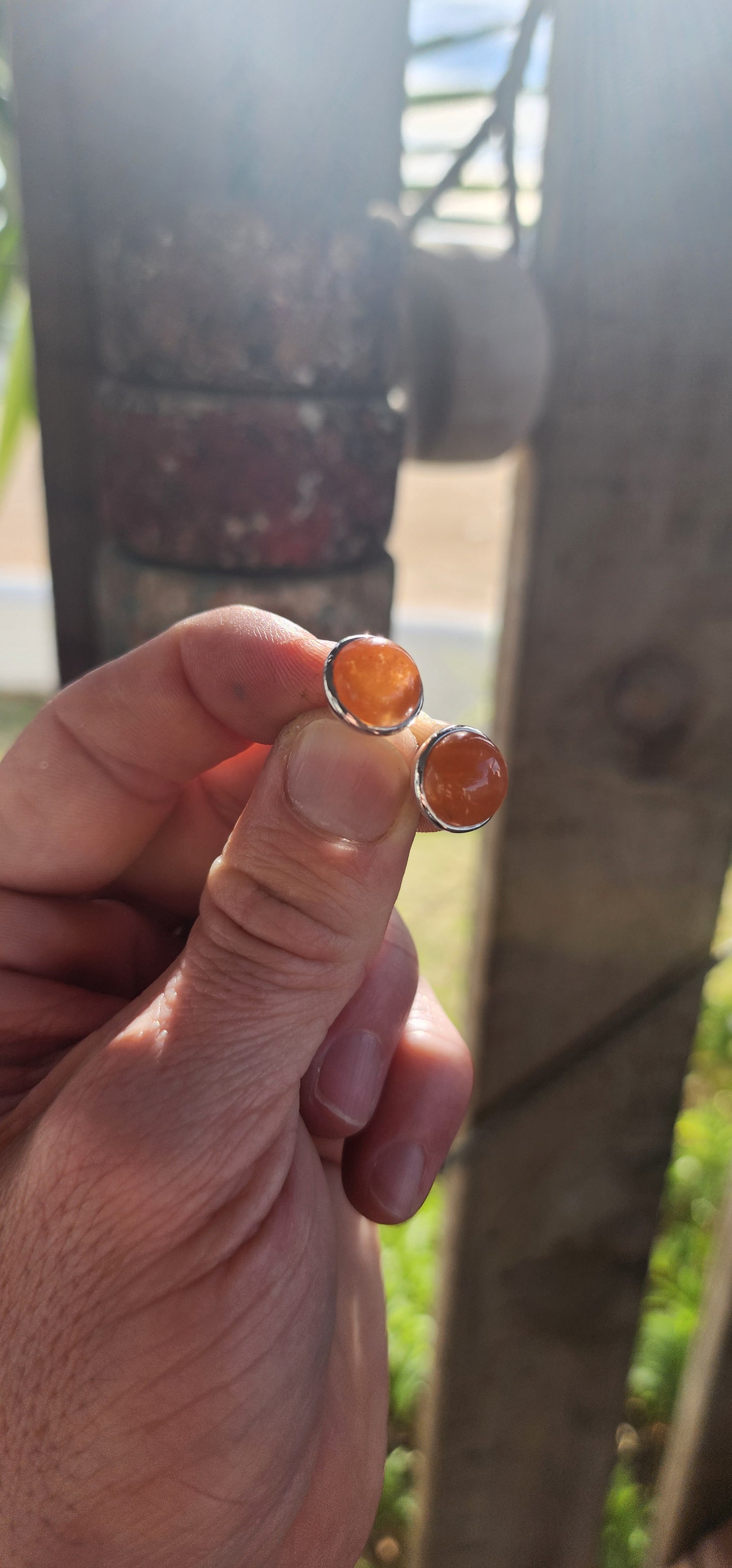 These marvelous sterling silver stud earrings deliver that effortless, earthy elegance that only natural gemstones can. Each earring features a warm, glowing round carnelian cabochon, tube-set in polished sterling silver for a clean, modern look.