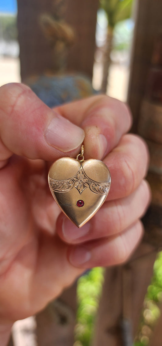 A truly breathtaking treasure from the romantic Edwardian era, this antique circa 1900 puffed heart pendant has survived more than 120 years with its beauty, grace, and symbolism entirely intact.