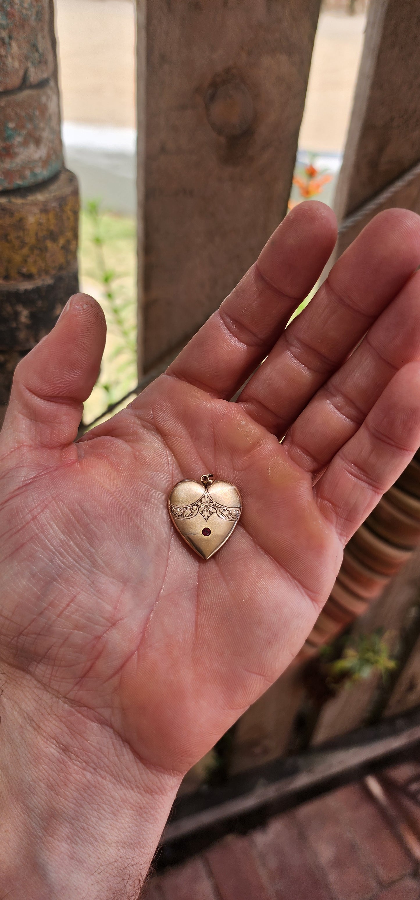 A truly breathtaking treasure from the romantic Edwardian era, this antique circa 1900 puffed heart pendant has survived more than 120 years with its beauty, grace, and symbolism entirely intact.