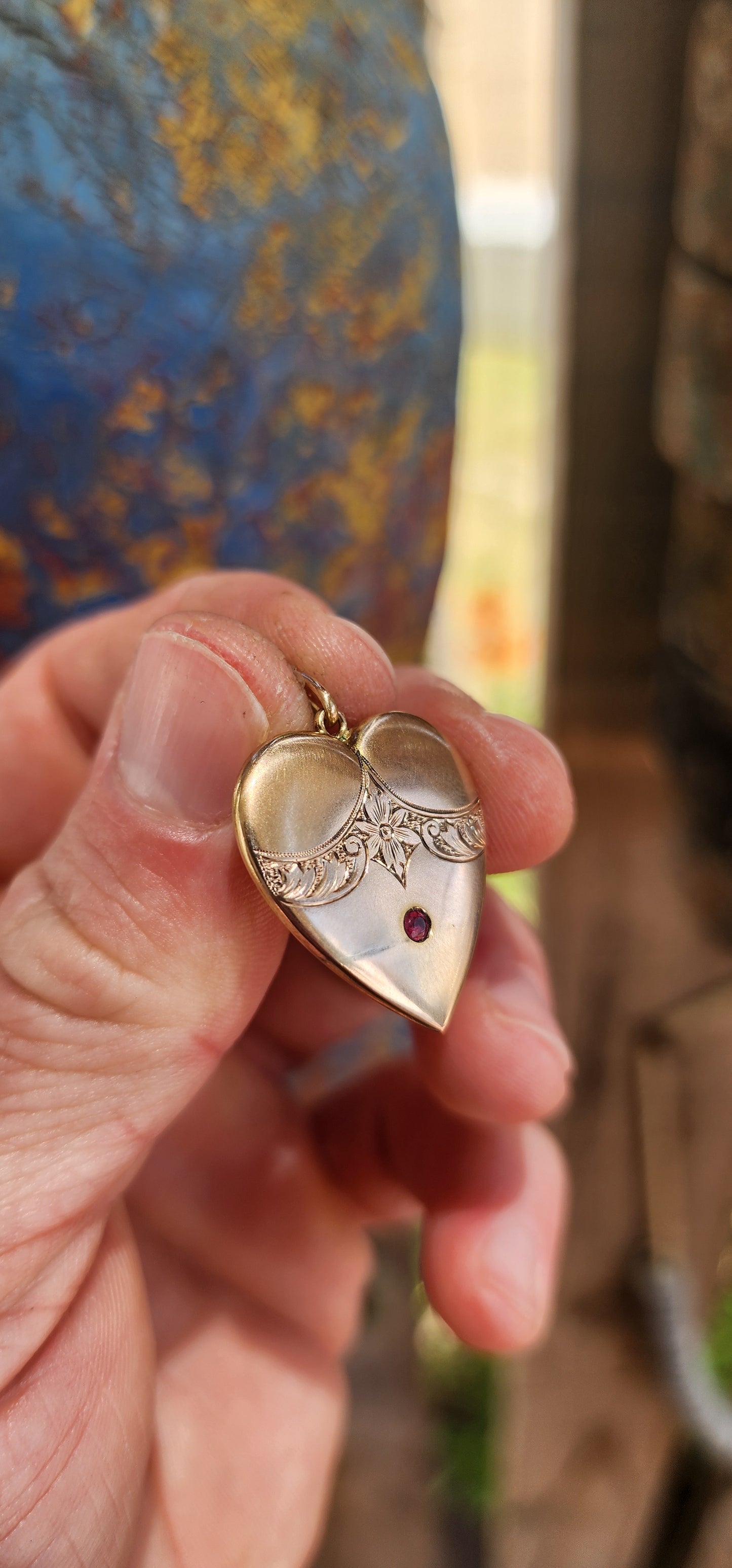 A truly breathtaking treasure from the romantic Edwardian era, this antique circa 1900 puffed heart pendant has survived more than 120 years with its beauty, grace, and symbolism entirely intact.
