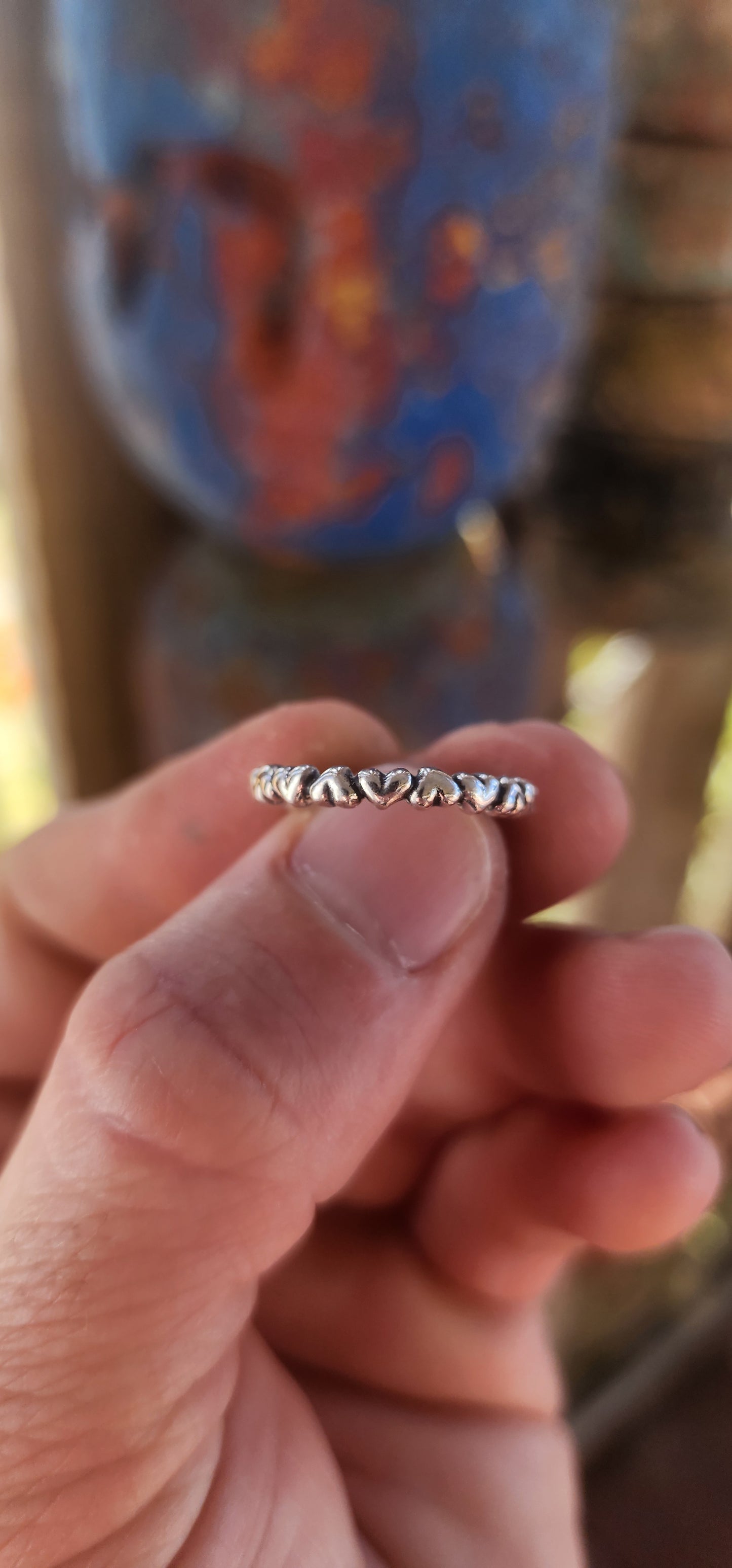 Serving major sweet-but-stylish vibes, this gorgeous designer sterling silver “Forever Love” full-eternity ring by P-a-n-d-o-r-a is the cutest little statement of affection you can slide onto your finger.