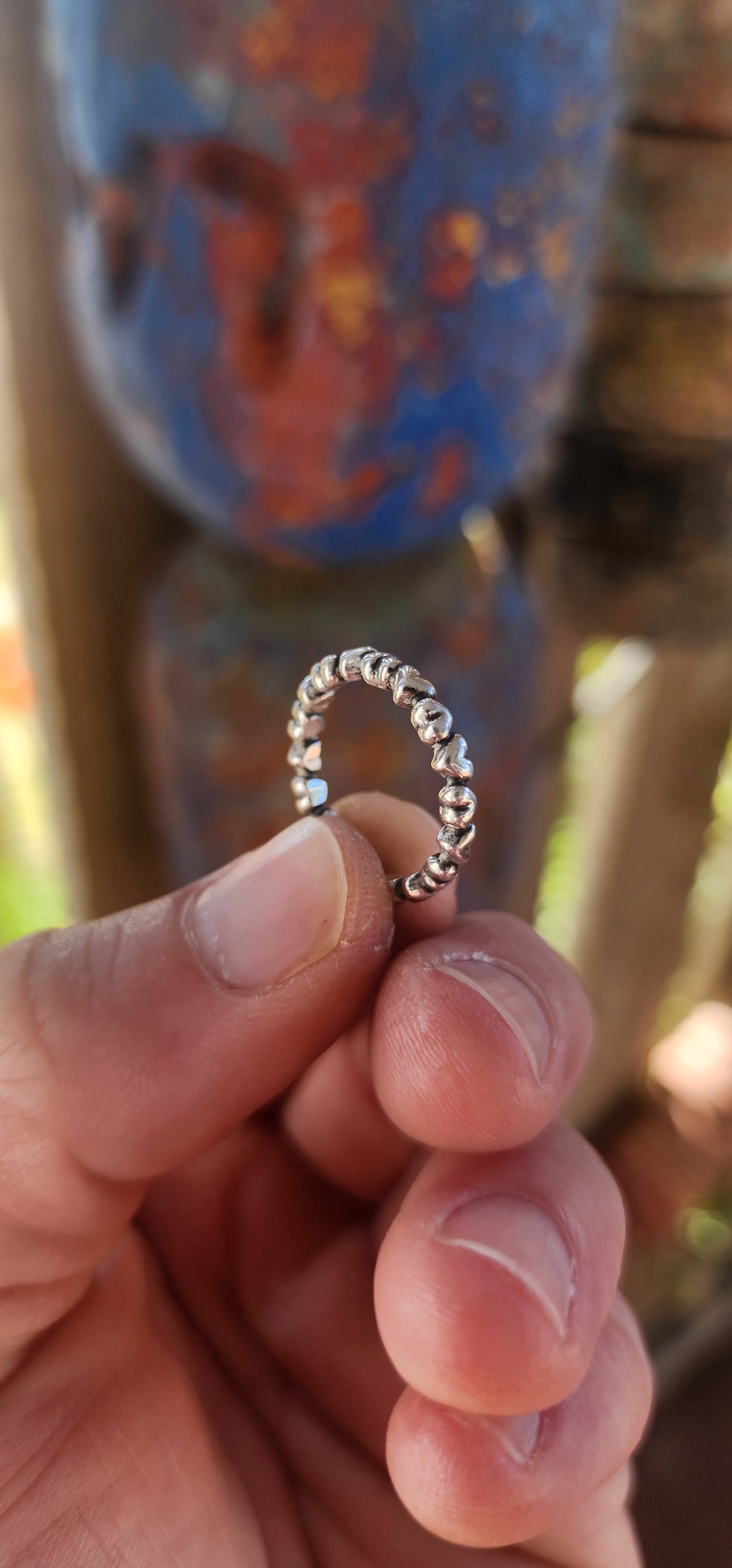 Serving major sweet-but-stylish vibes, this gorgeous designer sterling silver “Forever Love” full-eternity ring by P-a-n-d-o-r-a is the cutest little statement of affection you can slide onto your finger.