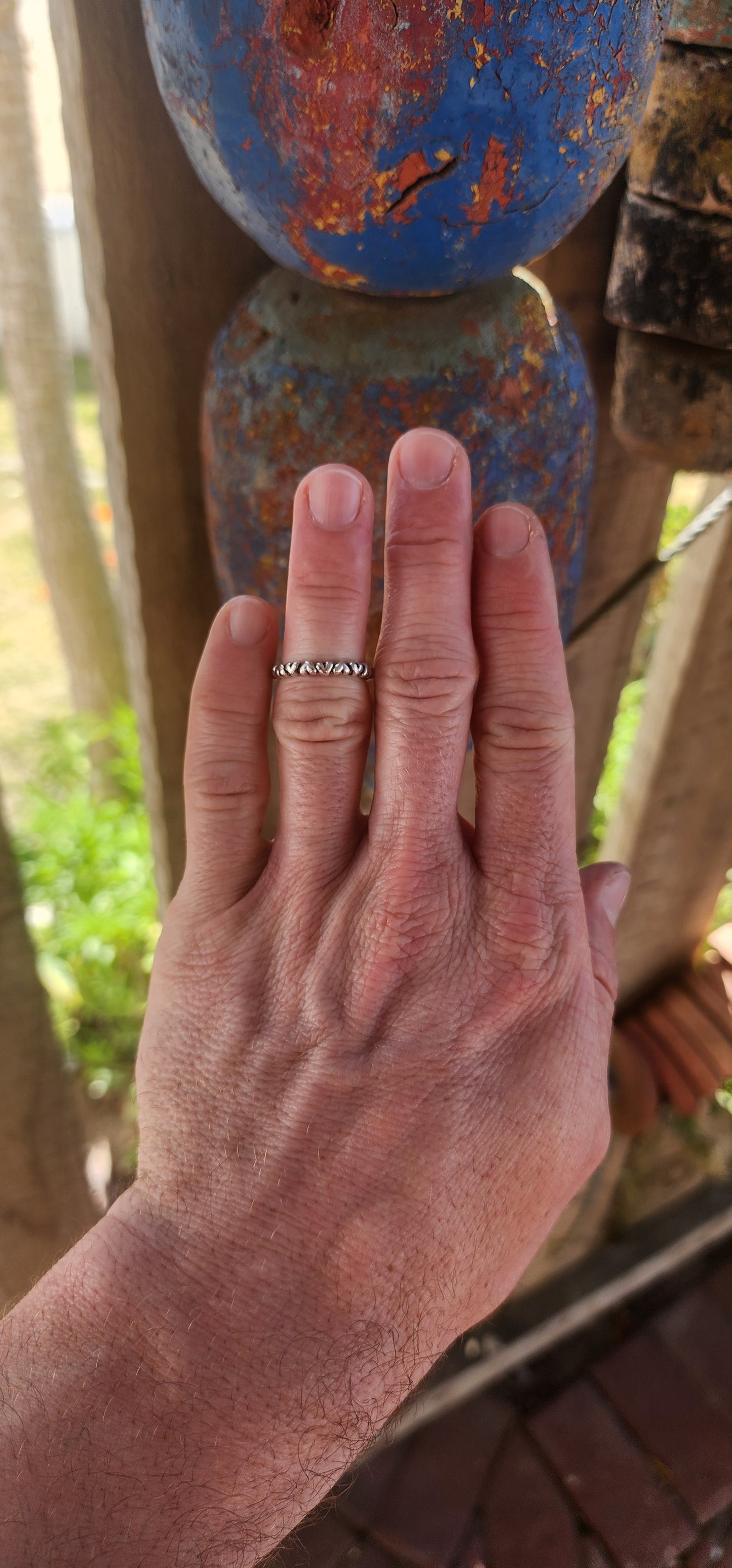 Serving major sweet-but-stylish vibes, this gorgeous designer sterling silver “Forever Love” full-eternity ring by P-a-n-d-o-r-a is the cutest little statement of affection you can slide onto your finger.