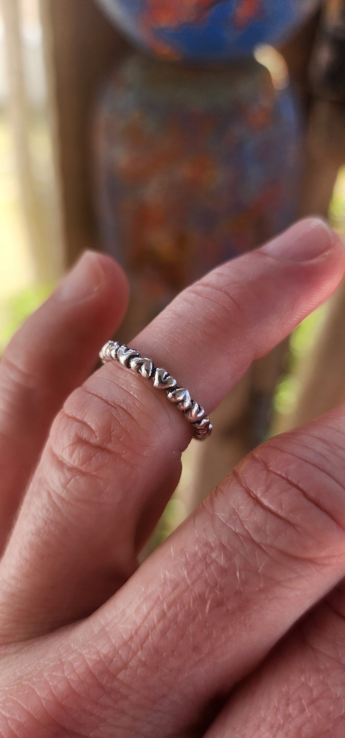 Serving major sweet-but-stylish vibes, this gorgeous designer sterling silver “Forever Love” full-eternity ring by P-a-n-d-o-r-a is the cutest little statement of affection you can slide onto your finger.