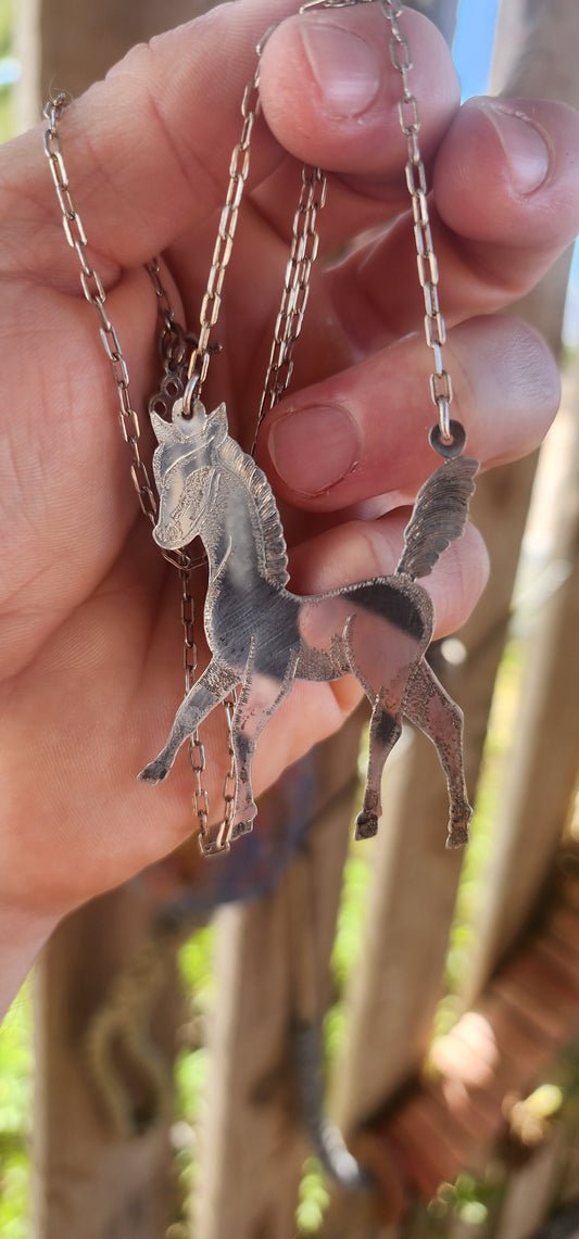 This one-of-a-kind artisan-made sterling silver horse pendant is the definition of whimsical statement jewelry — bold, unusual, and absolutely impossible to ignore!