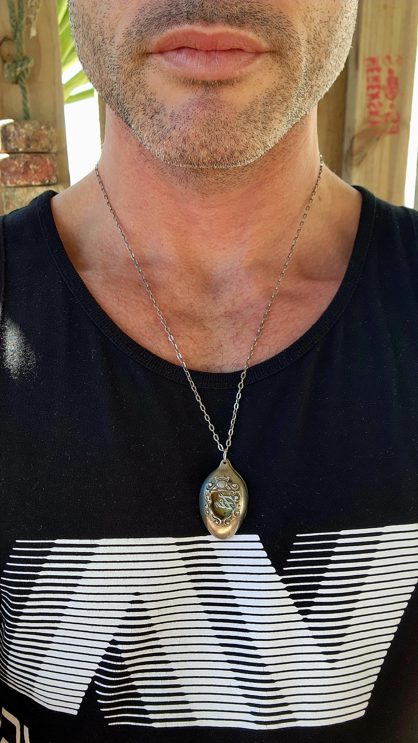 Exceptionally striking recycled spoon pendant by the South African maker Zim.