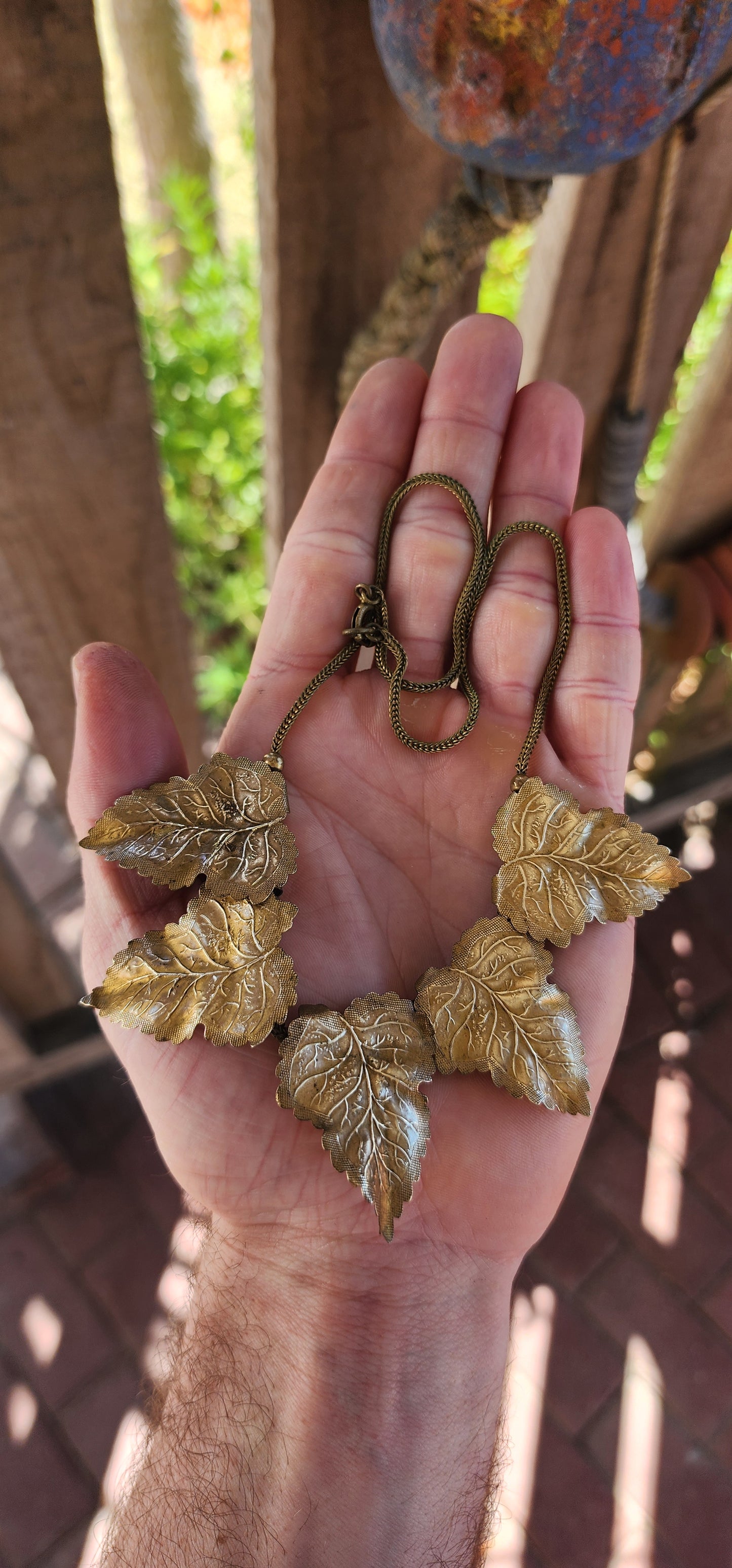 Steeped in late–19th century romance and draped in the organic beauty that defined the Art Nouveau spirit, this marvelous Antique Victorian / Art Nouveau era necklace (circa 1890s) is a treasure out of a painterly vineyard scene.