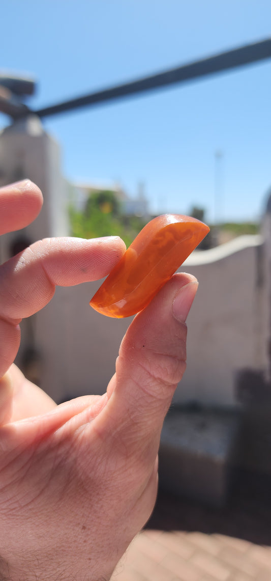 This striking brooch is a beautiful celebration of natural Baltic amber sculpted through a modernist lens, where form, warmth, and organic elegance take centre stage.