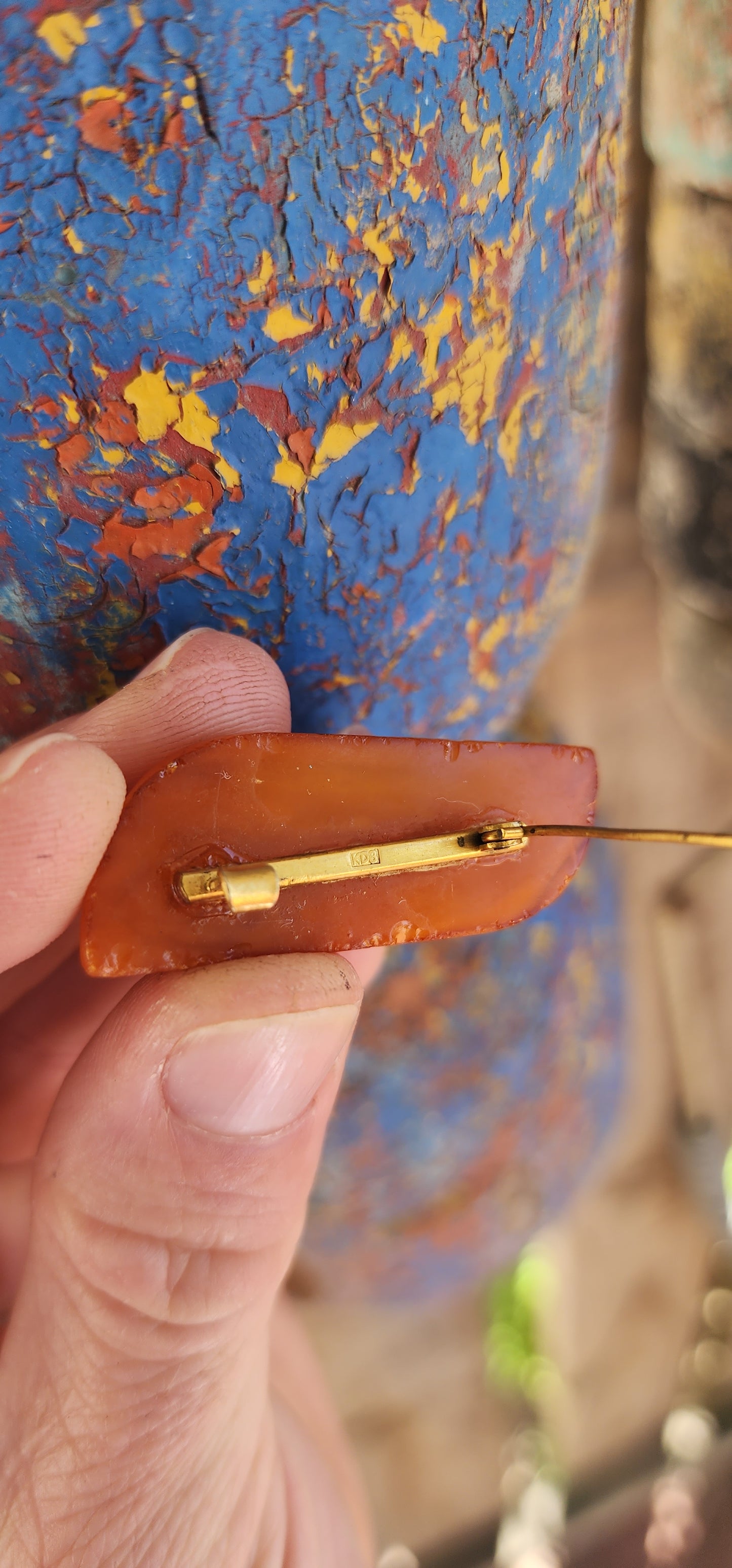 This striking brooch is a beautiful celebration of natural Baltic amber sculpted through a modernist lens, where form, warmth, and organic elegance take centre stage.