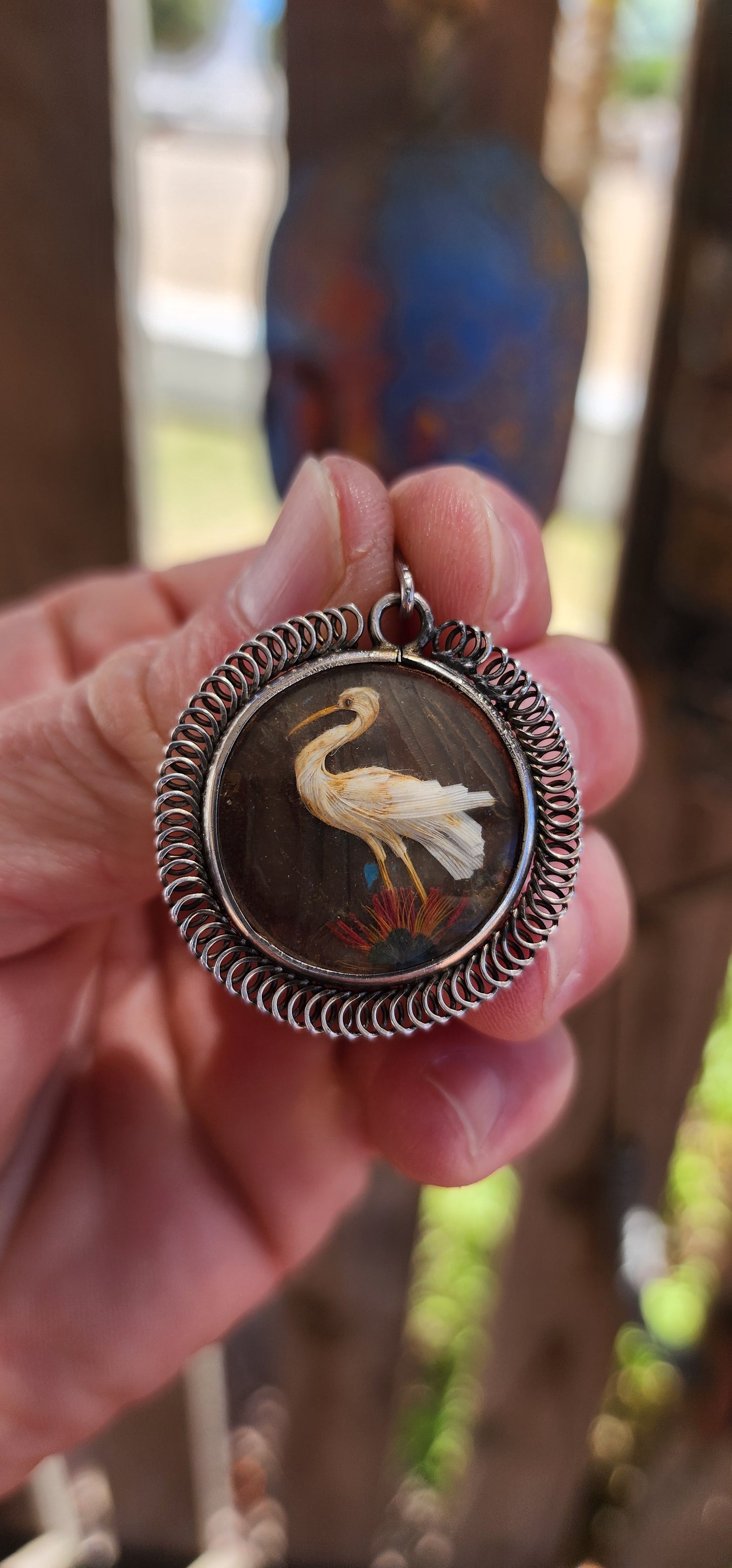 This extraordinary antique late Victorian–era double-sided sterling silver locket pendant is nothing short of a miniature museum piece — a breathtaking fusion of natural history, fine craftsmanship, and romantic 19th-century artistry.