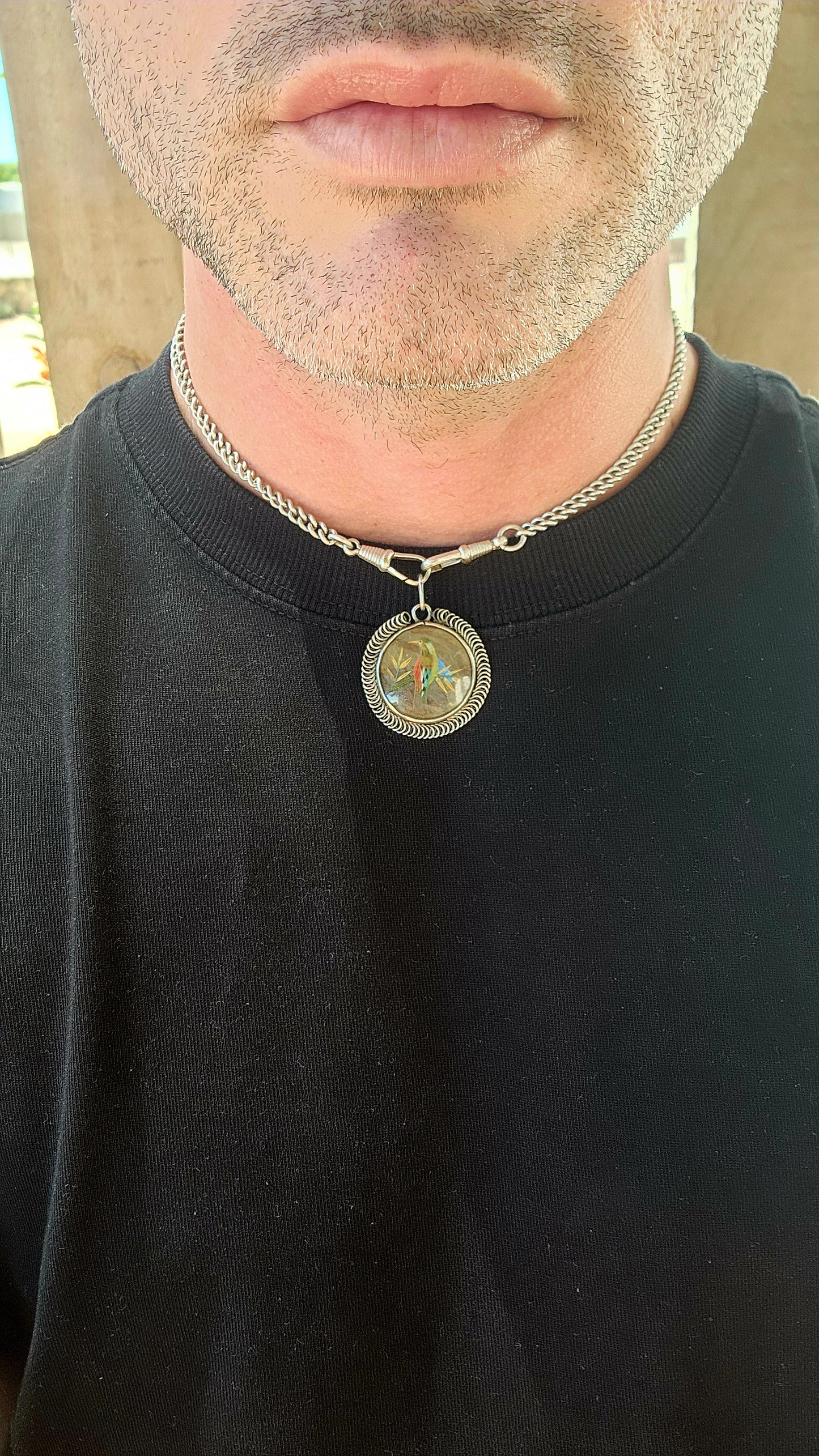 This extraordinary antique late Victorian–era double-sided sterling silver locket pendant is nothing short of a miniature museum piece — a breathtaking fusion of natural history, fine craftsmanship, and romantic 19th-century artistry.