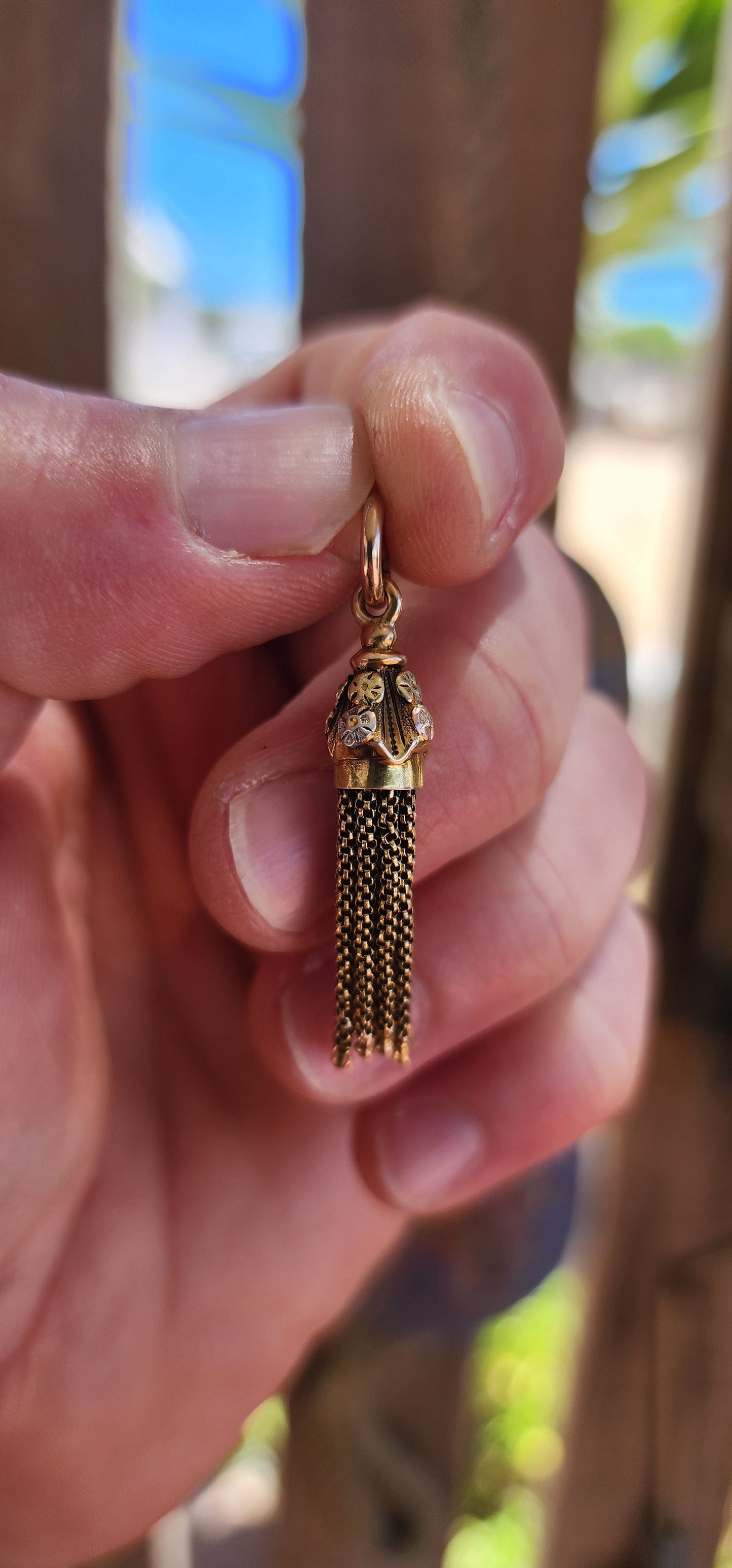 This exquisite antique Victorian-era tassel pendant is the very definition of elegance — a jewel that whispers stories from the 19th century while still feeling impossibly chic today.