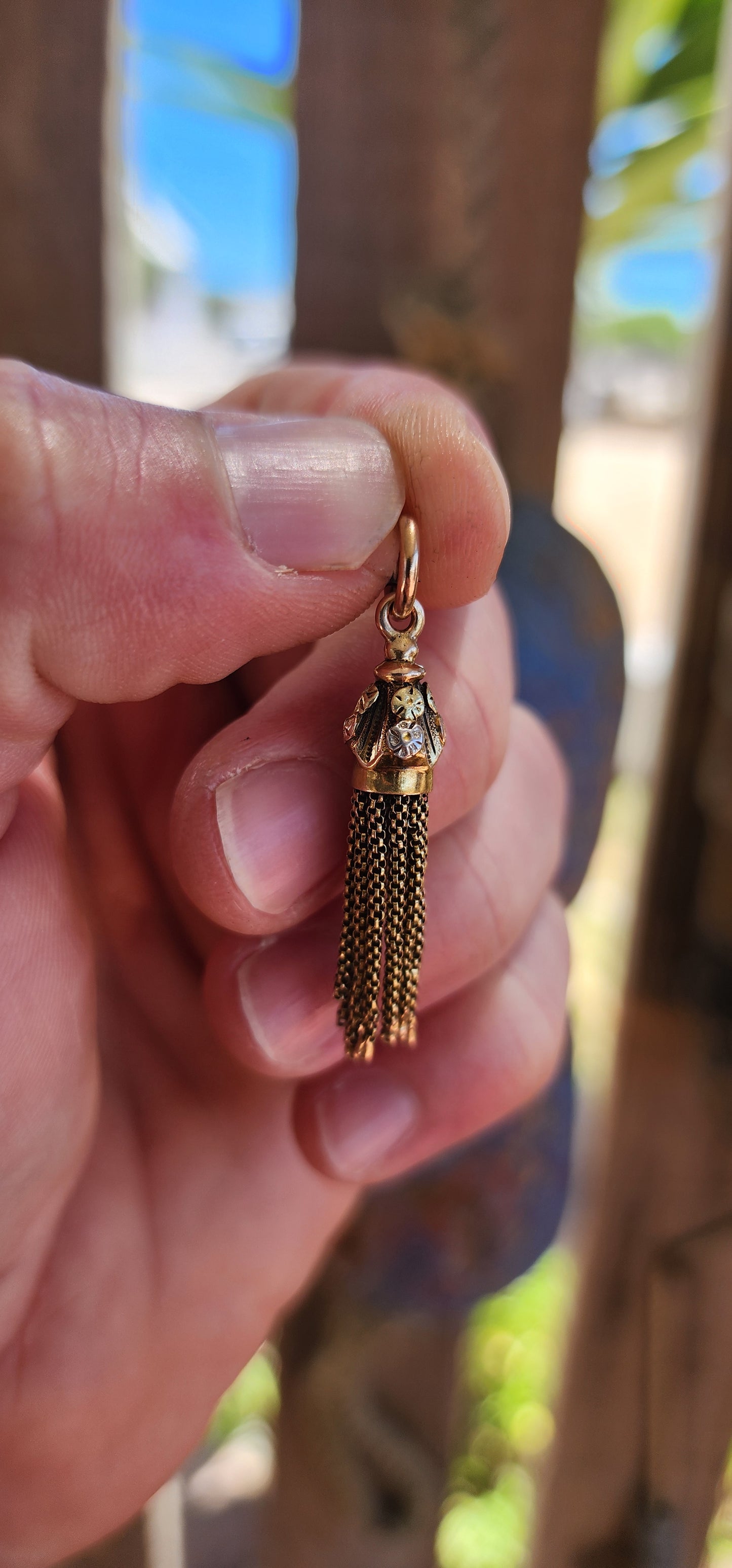This exquisite antique Victorian-era tassel pendant is the very definition of elegance — a jewel that whispers stories from the 19th century while still feeling impossibly chic today.