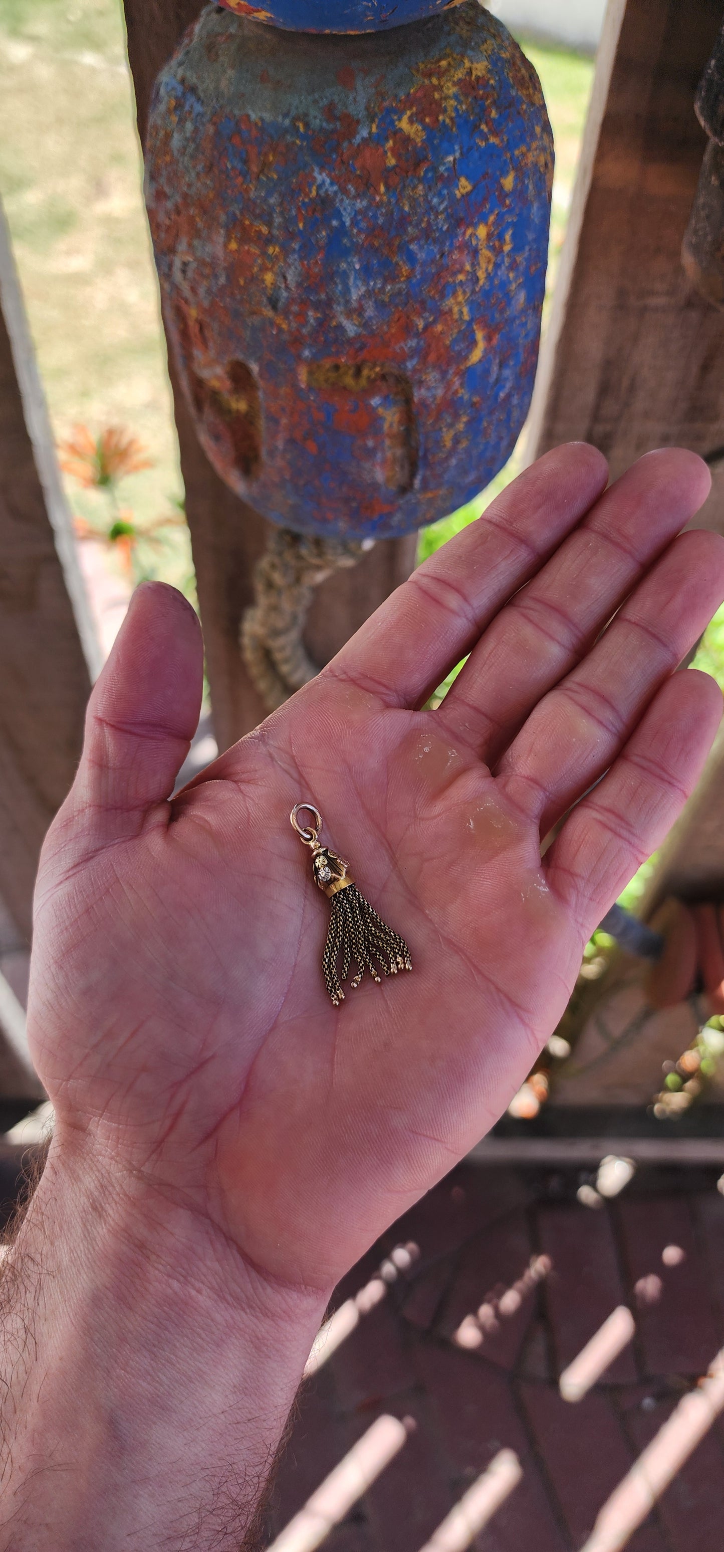 This exquisite antique Victorian-era tassel pendant is the very definition of elegance — a jewel that whispers stories from the 19th century while still feeling impossibly chic today.