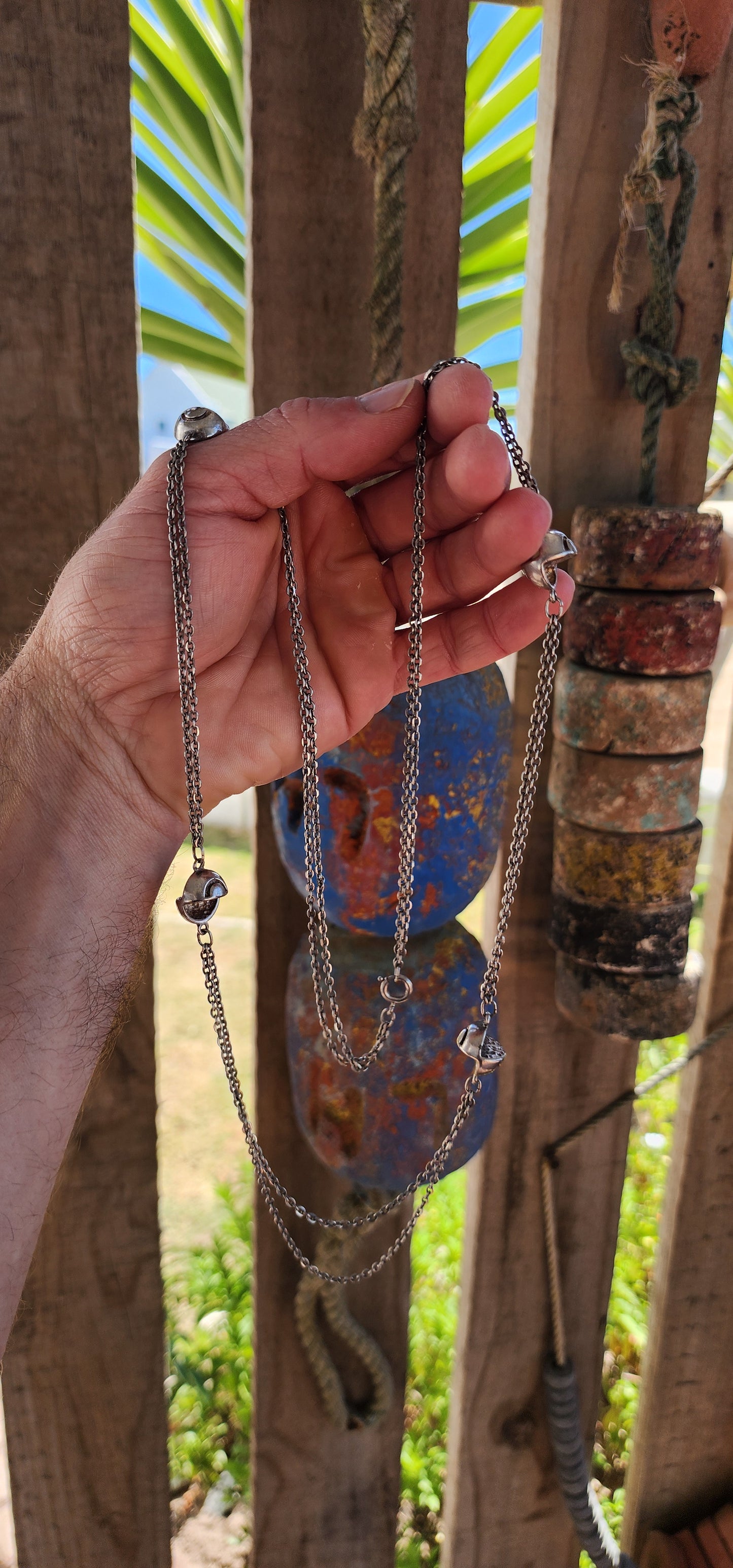 Up for grabs is an artisan-made, extra-length sterling silver modernist necklace that feels like it’s travelled straight through a wormhole from a futuristic design studio somewhere between 1960s Space Age optimism and outer-galactic couture.