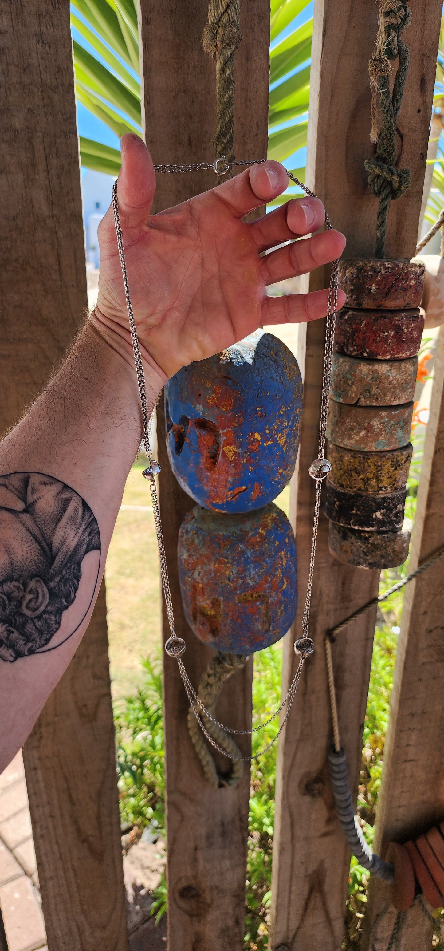 Up for grabs is an artisan-made, extra-length sterling silver modernist necklace that feels like it’s travelled straight through a wormhole from a futuristic design studio somewhere between 1960s Space Age optimism and outer-galactic couture.