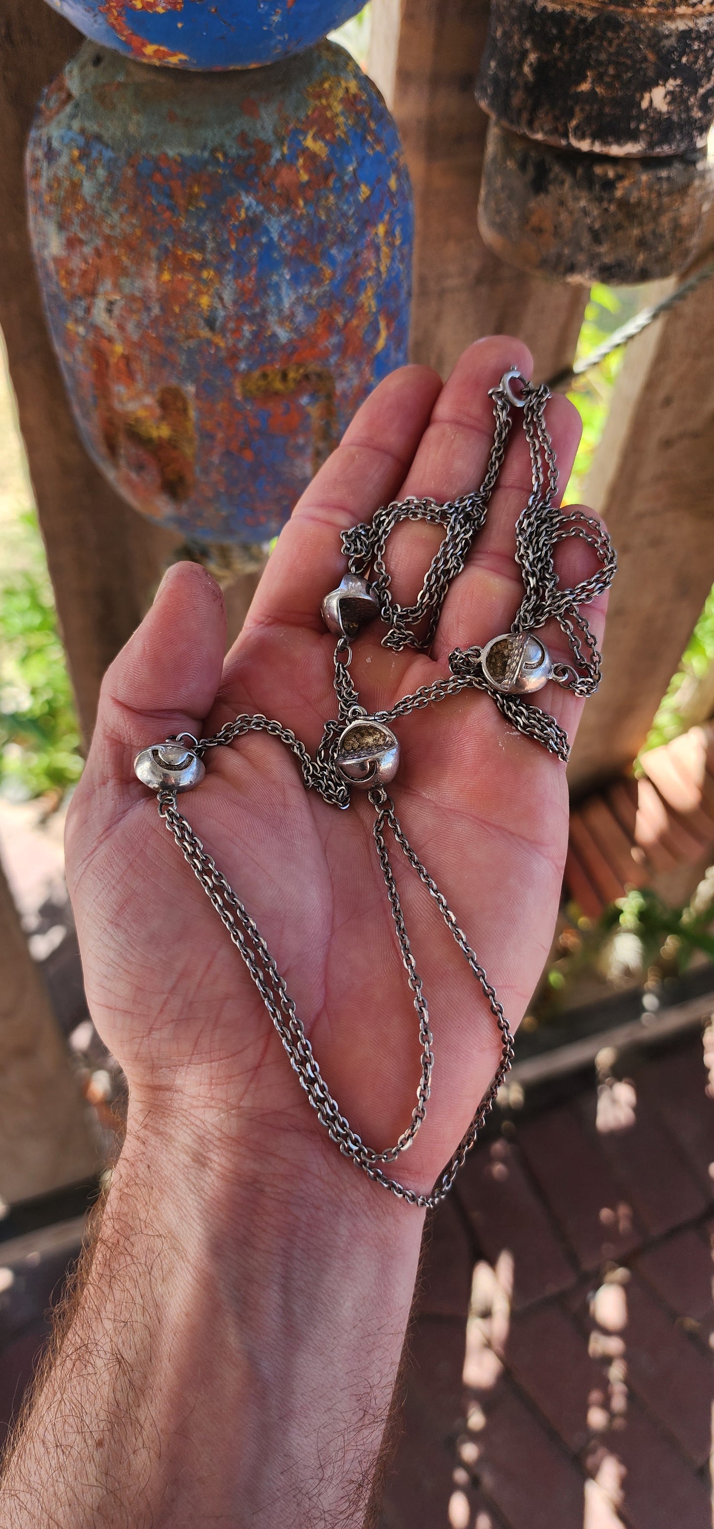 Up for grabs is an artisan-made, extra-length sterling silver modernist necklace that feels like it’s travelled straight through a wormhole from a futuristic design studio somewhere between 1960s Space Age optimism and outer-galactic couture.