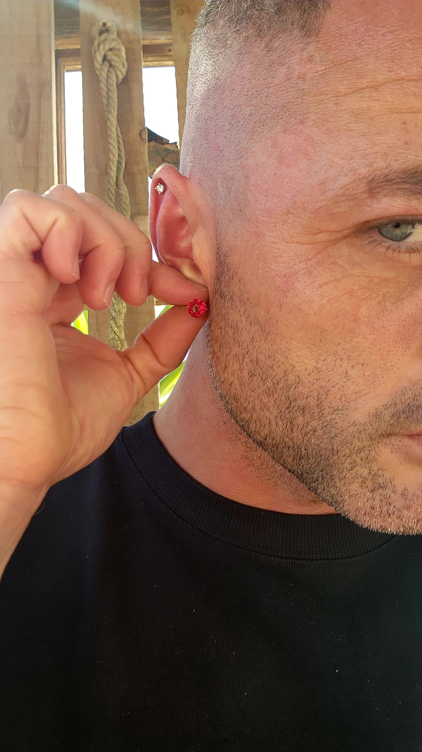 These are an exceptional and increasingly scarce pair of authentic Victorian-era stud earrings, dating to the mid–late 19th century, crafted in 9ct rose gold and set with vivid cranberry-red paste rhinestones of remarkable colour and life.
