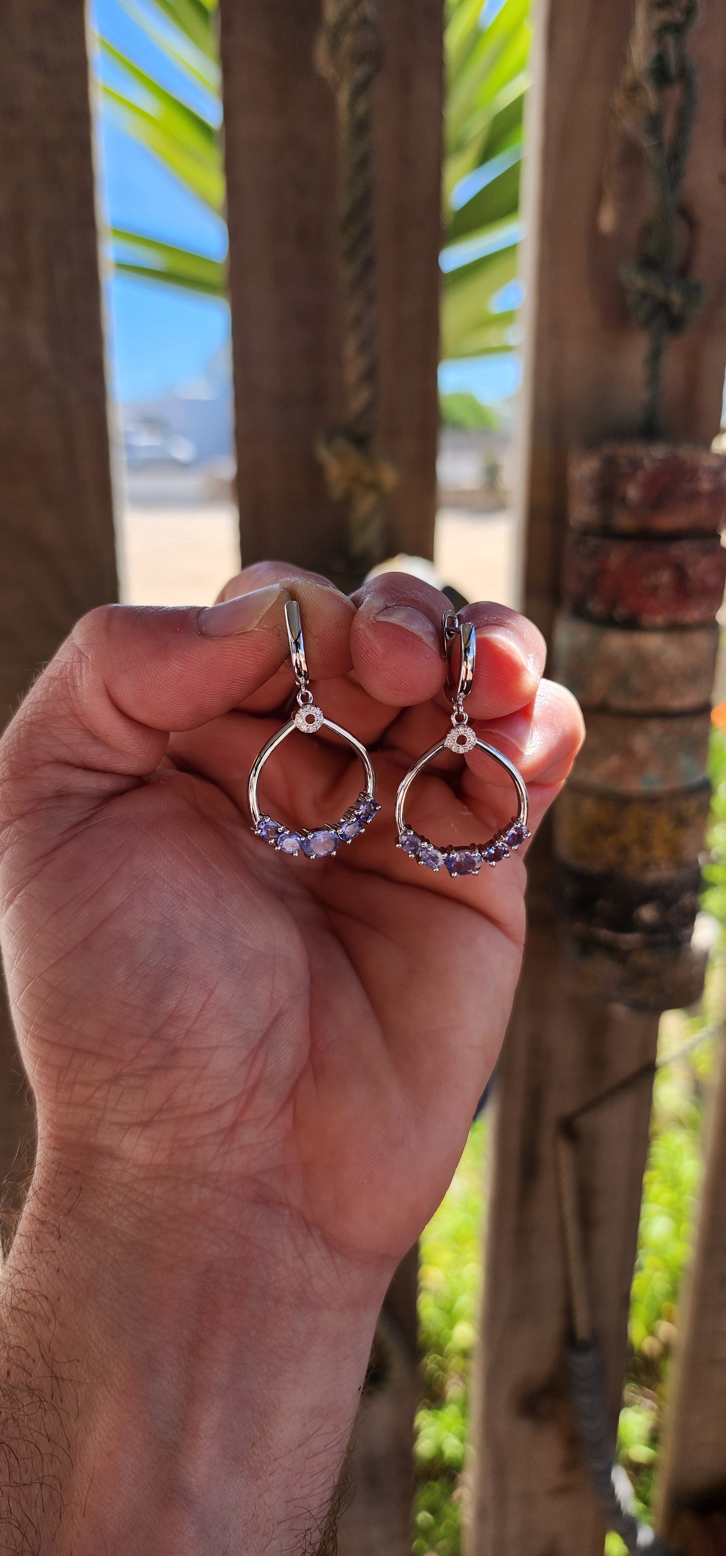 Classical, graceful, and quietly enchanting — these sterling silver dangle earrings are a beautiful celebration of Tanzanite’s magical colour play.