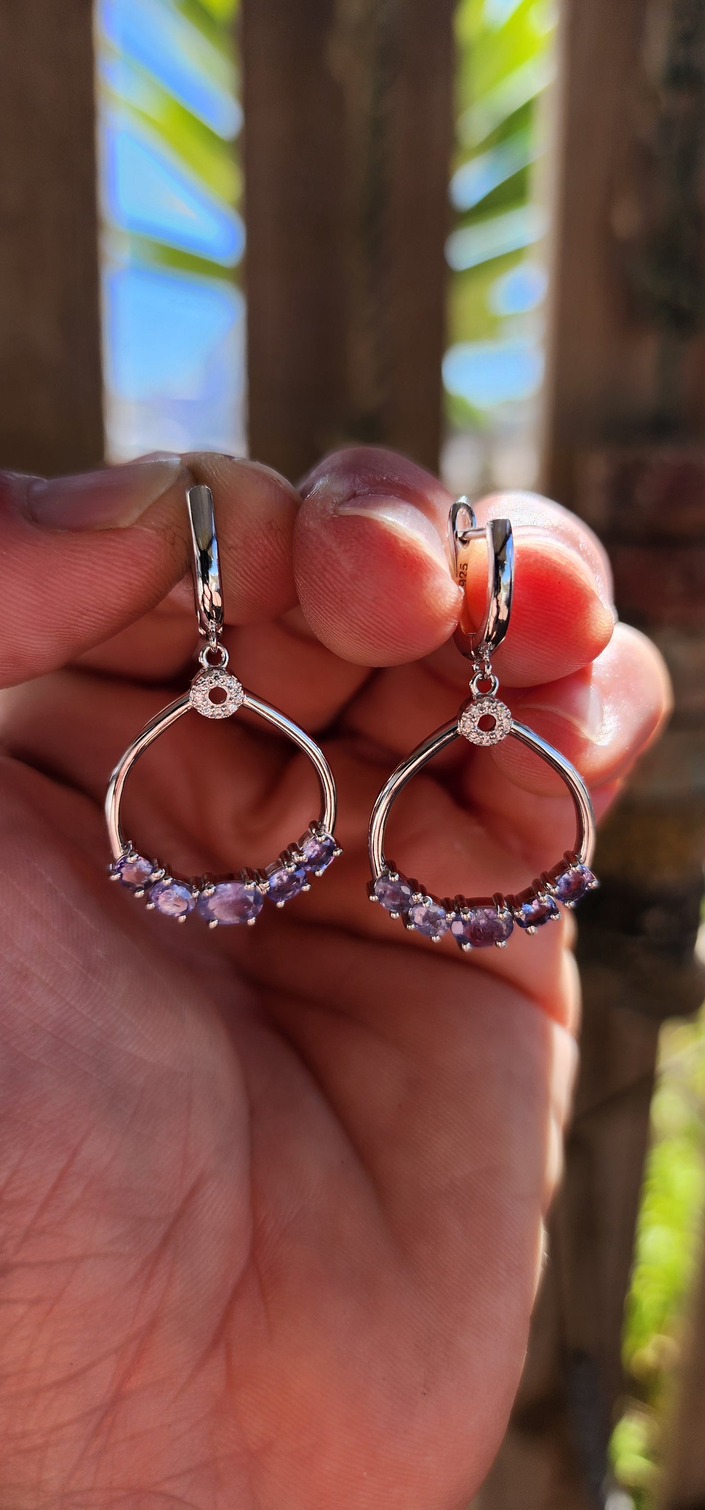 Classical, graceful, and quietly enchanting — these sterling silver dangle earrings are a beautiful celebration of Tanzanite’s magical colour play.