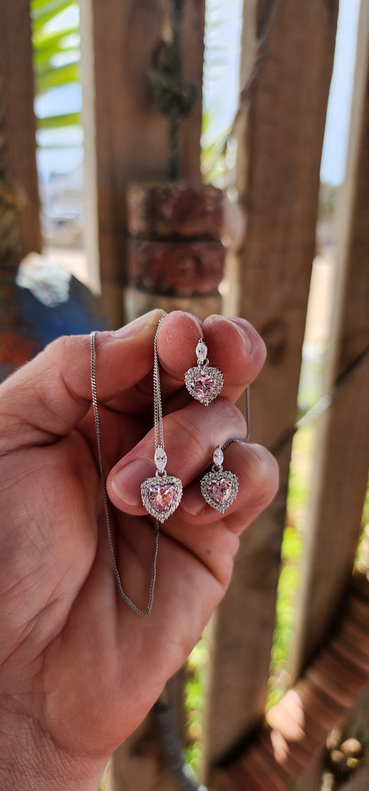 This utterly charming matching heart set is crafted in sterling silver and designed to steal hearts at first glance. Feminine, playful, and endlessly romantic.