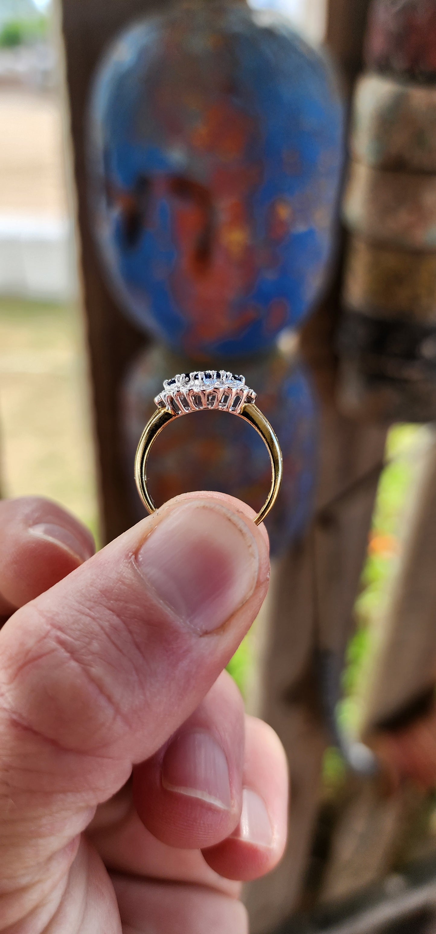 This exquisite bi-colour cluster ring is crafted in sterling silver with a luxurious 18ct yellow gold plated band, giving it an irresistible antique-inspired contrast.