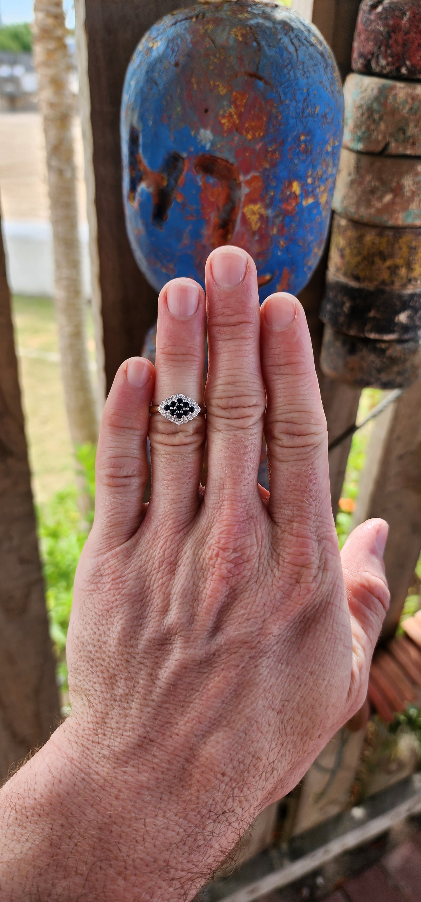 This exquisite bi-colour cluster ring is crafted in sterling silver with a luxurious 18ct yellow gold plated band, giving it an irresistible antique-inspired contrast.