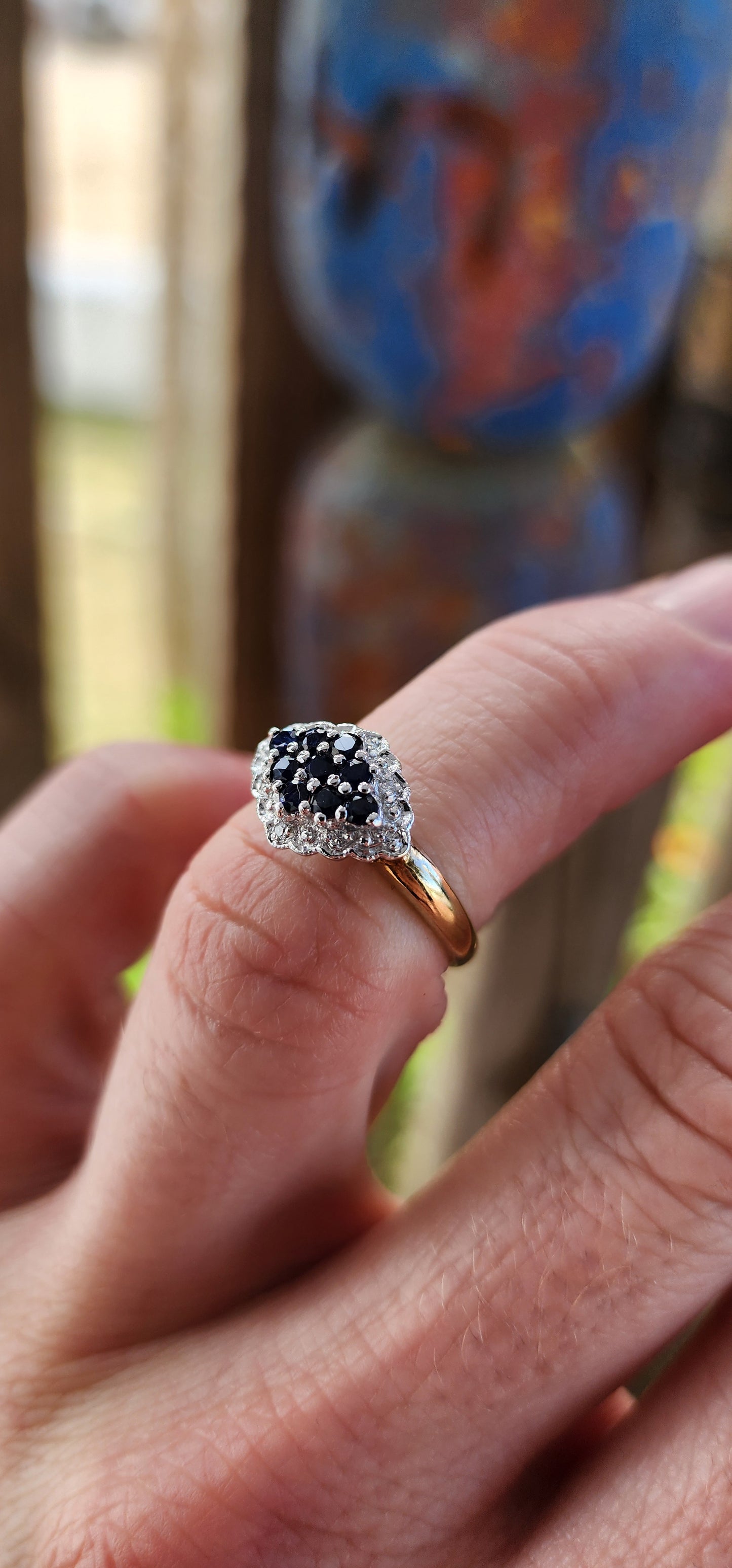 This exquisite bi-colour cluster ring is crafted in sterling silver with a luxurious 18ct yellow gold plated band, giving it an irresistible antique-inspired contrast.