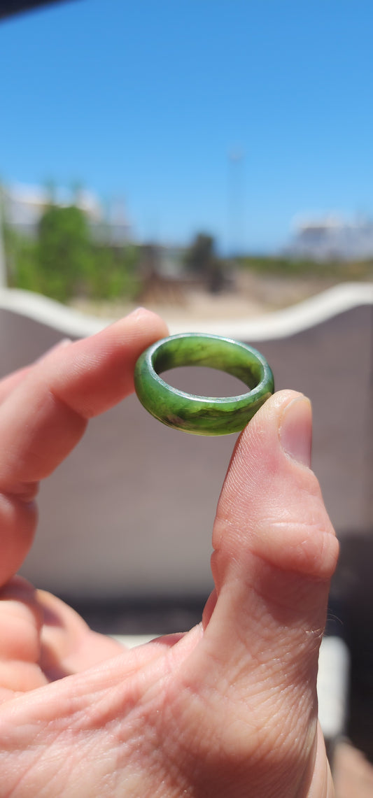 This vintage, chunky solidly carved nephrite spinach jade ring is a true talisman piece — powerful in presence yet wonderfully organic in feel.