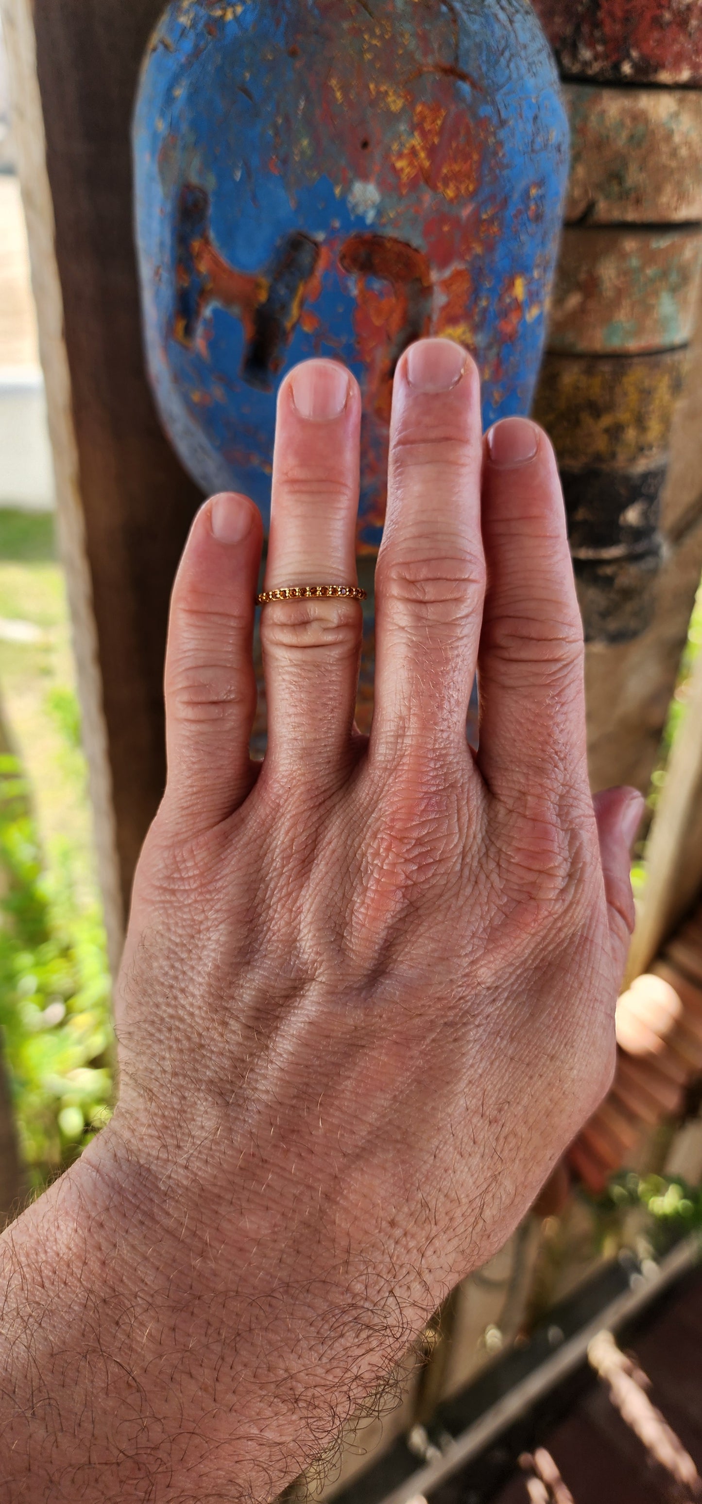 A sterling silver full eternity stacking ring, luxuriously plated in 18ct yellow gold and adorned with a continuous circle of sparkling Orange Madeira Citrine's.