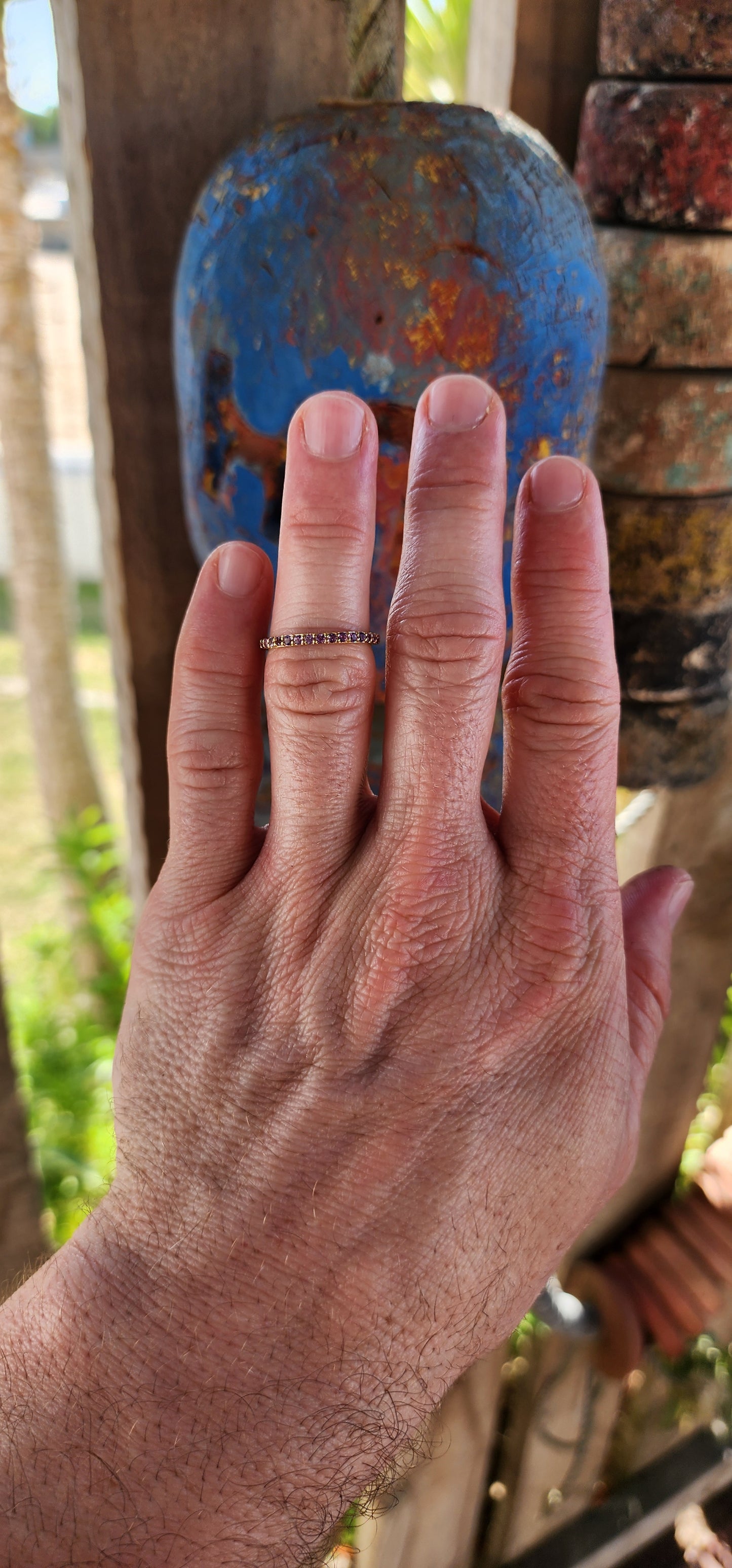 A sterling silver full eternity stacking ring, luxuriously plated in 18ct yellow gold and adorned with a continuous circle of sparkling Purple Amethyst's.