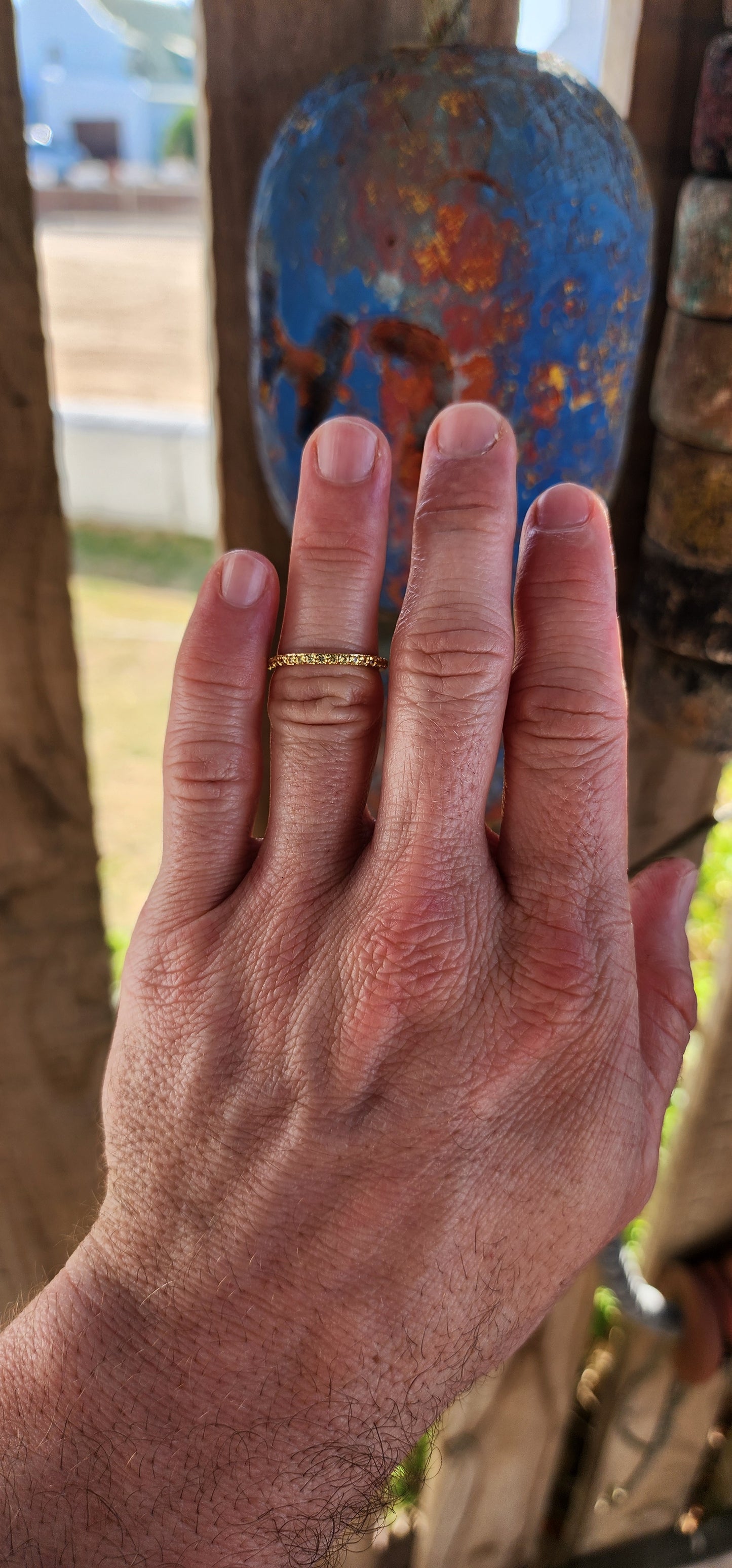 A sterling silver full eternity stacking ring, luxuriously plated in 18ct yellow gold and adorned with a continuous circle of sparkling Yellow Sapphires.