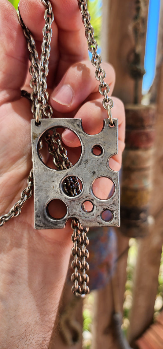 This vintage circa 1960s modernist / brutalist pendant is a wonderfully playful yet architectural creation by the sought-after Danish designer Anders Andersen.