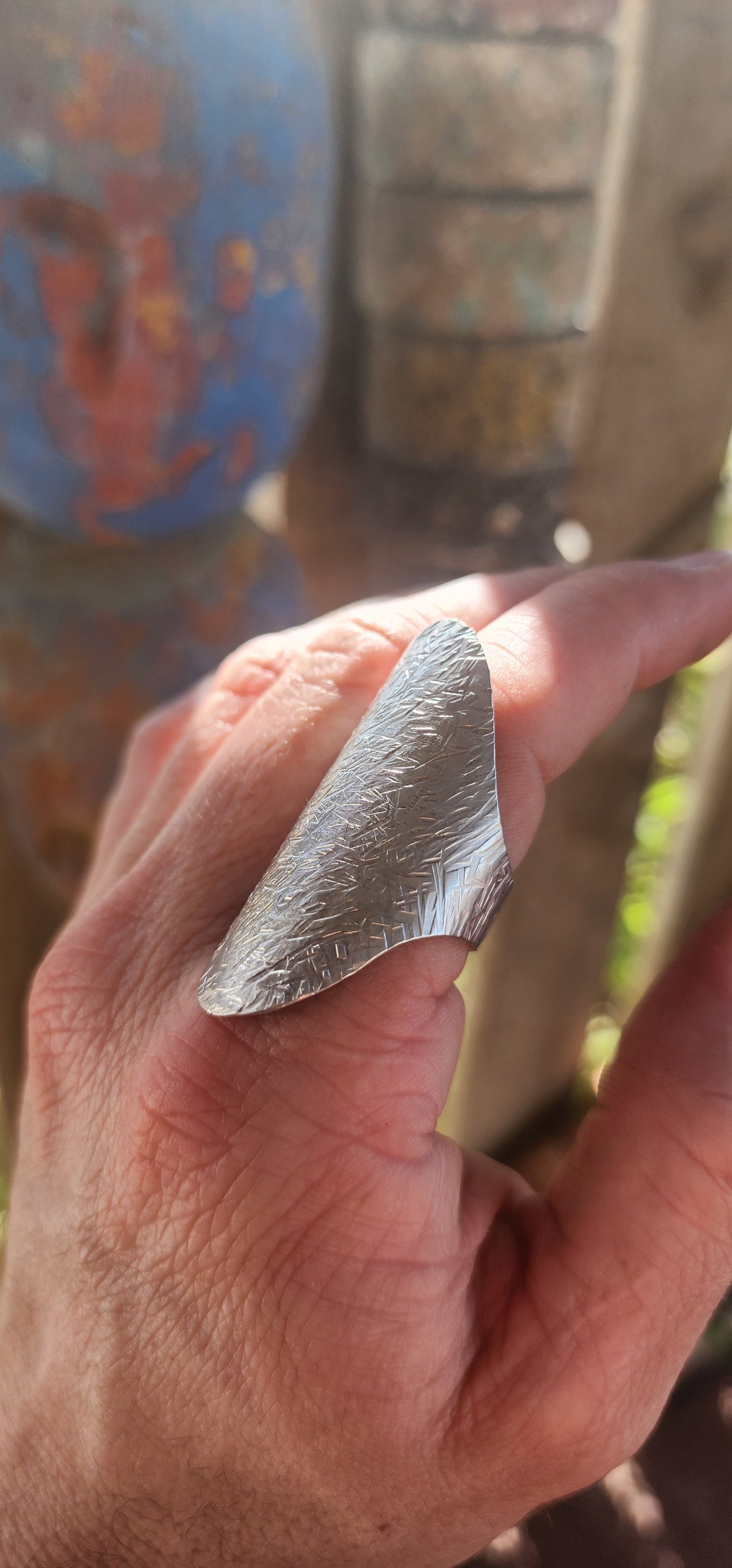 An artisan-made statement ring crafted in solid sterling silver, designed for lovers of sculptural, hand-forged beauty.