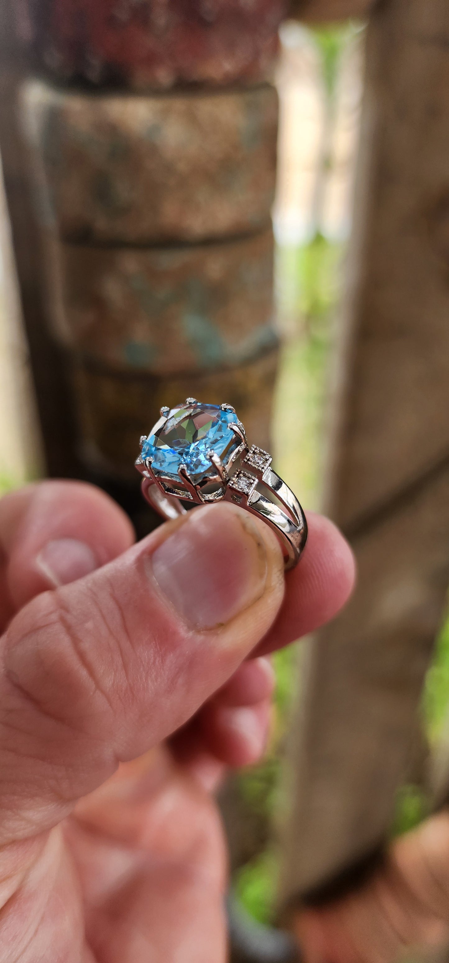 A remarkably beautiful trilogy-style dress ring crafted in gleaming sterling silver, dripping in Deco-revival glamour with a bold, confident presence on the hand.