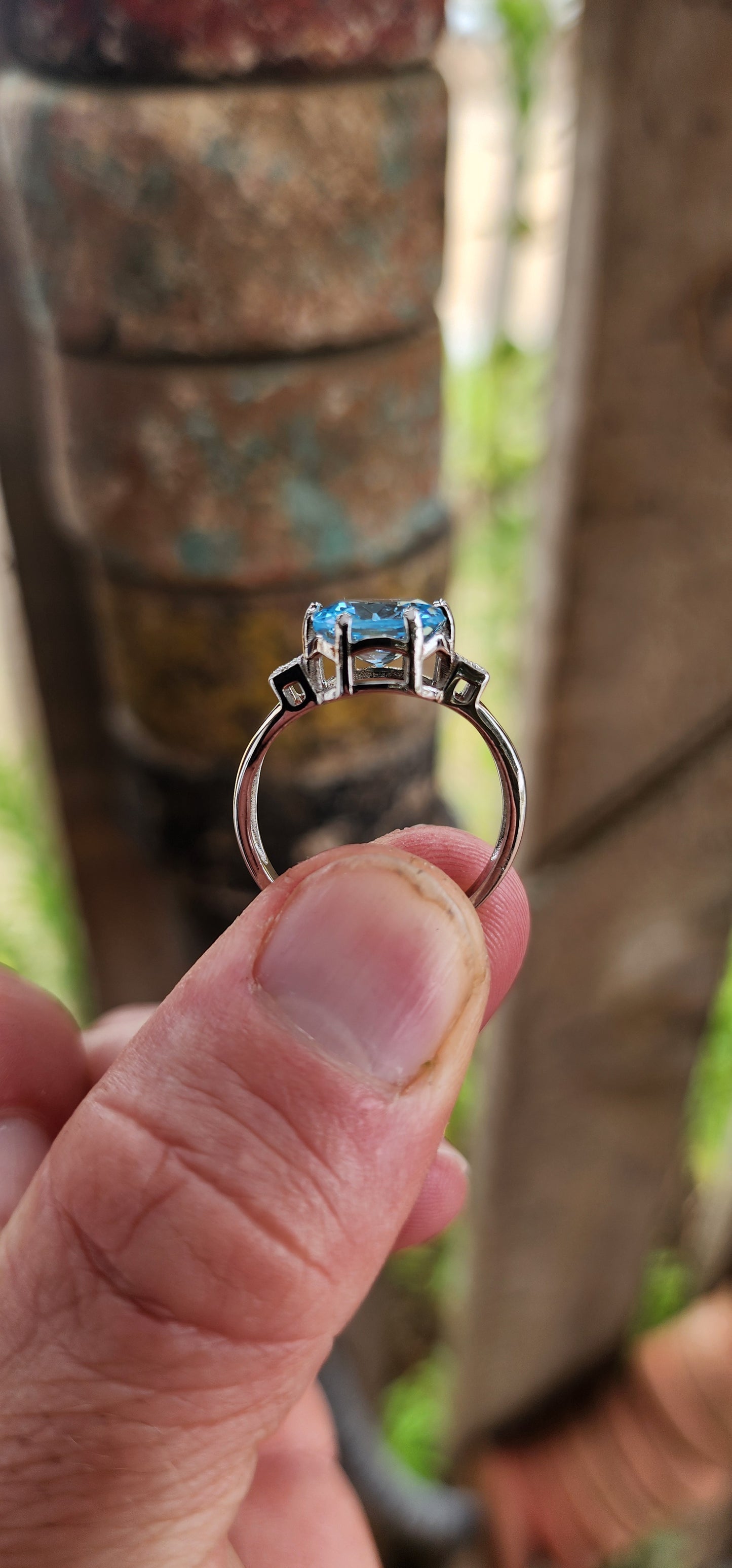 A remarkably beautiful trilogy-style dress ring crafted in gleaming sterling silver, dripping in Deco-revival glamour with a bold, confident presence on the hand.