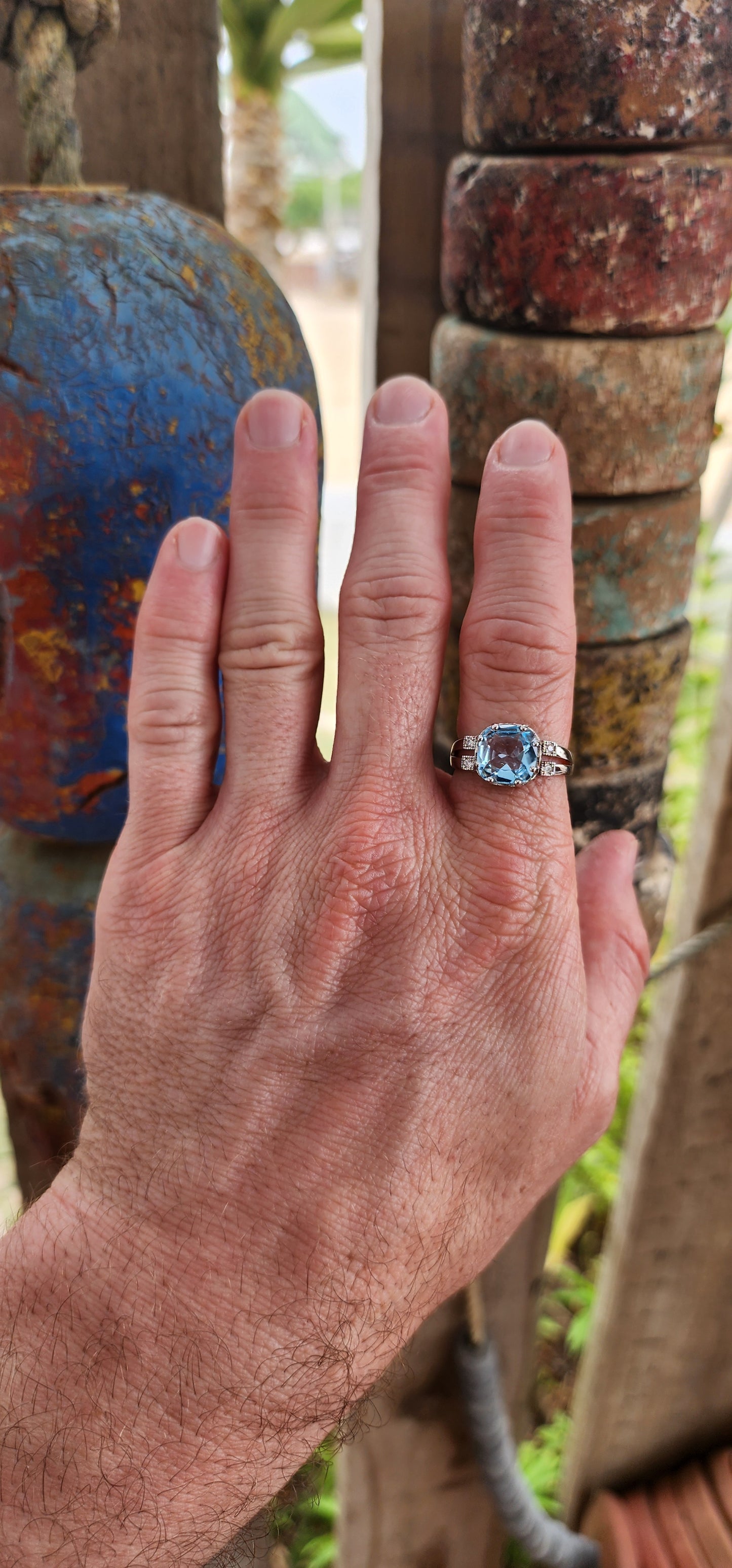 A remarkably beautiful trilogy-style dress ring crafted in gleaming sterling silver, dripping in Deco-revival glamour with a bold, confident presence on the hand.