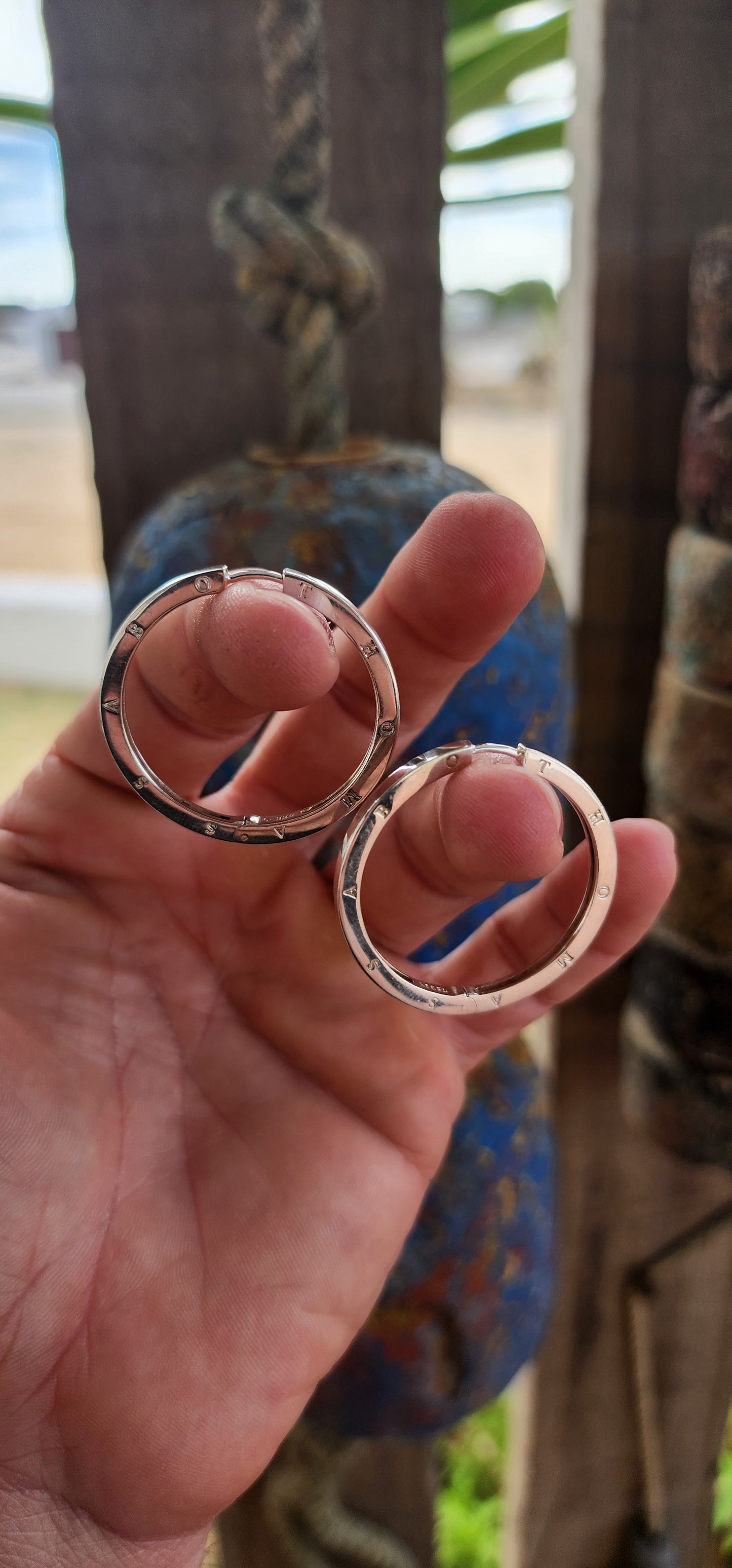 These oversized designer sterling silver hoop earrings are all about confident, no-nonsense glamour with a cool, modern edge.