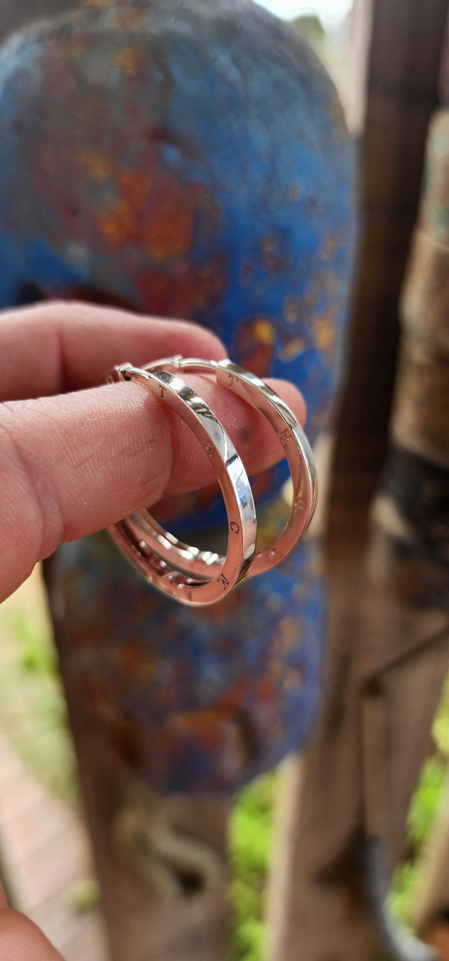 These oversized designer sterling silver hoop earrings are all about confident, no-nonsense glamour with a cool, modern edge.