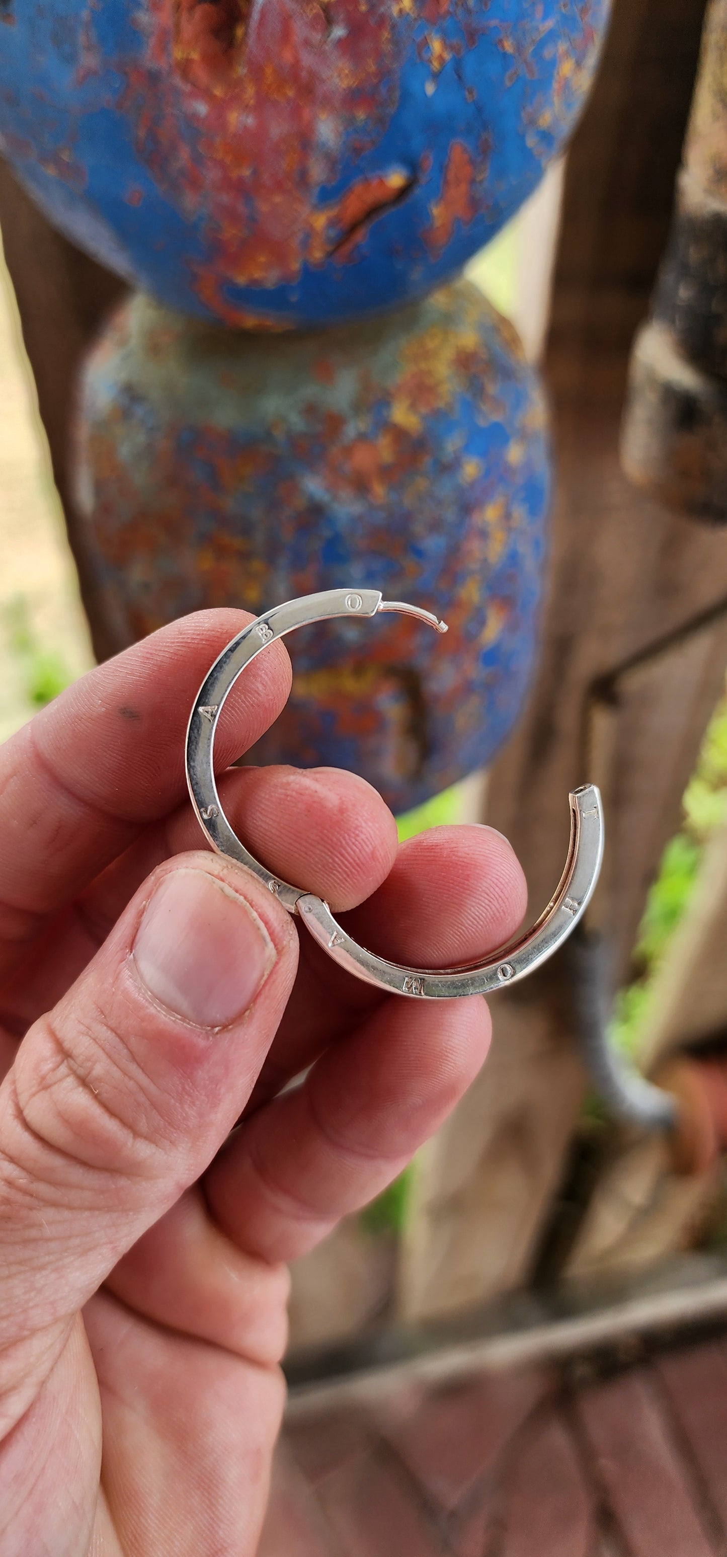 These oversized designer sterling silver hoop earrings are all about confident, no-nonsense glamour with a cool, modern edge.
